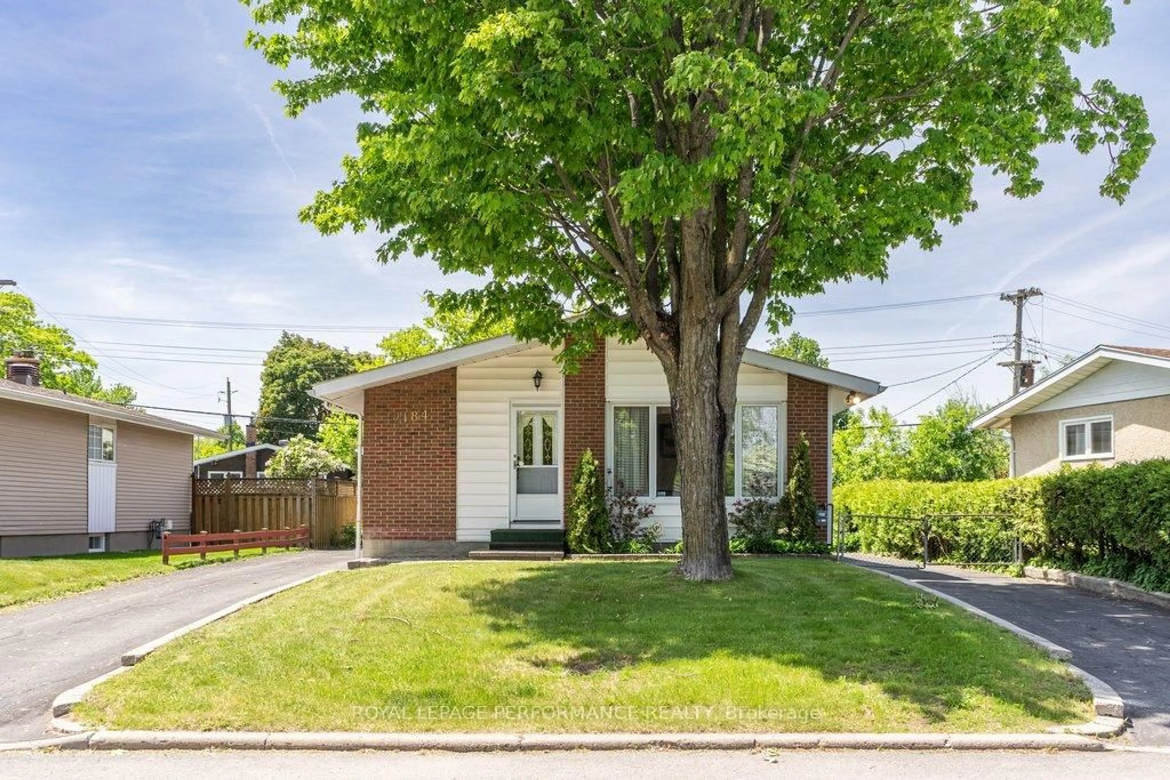 Home with brick exterior material, street for 2184 Melfort St, Ottawa Ontario K1G 1H7