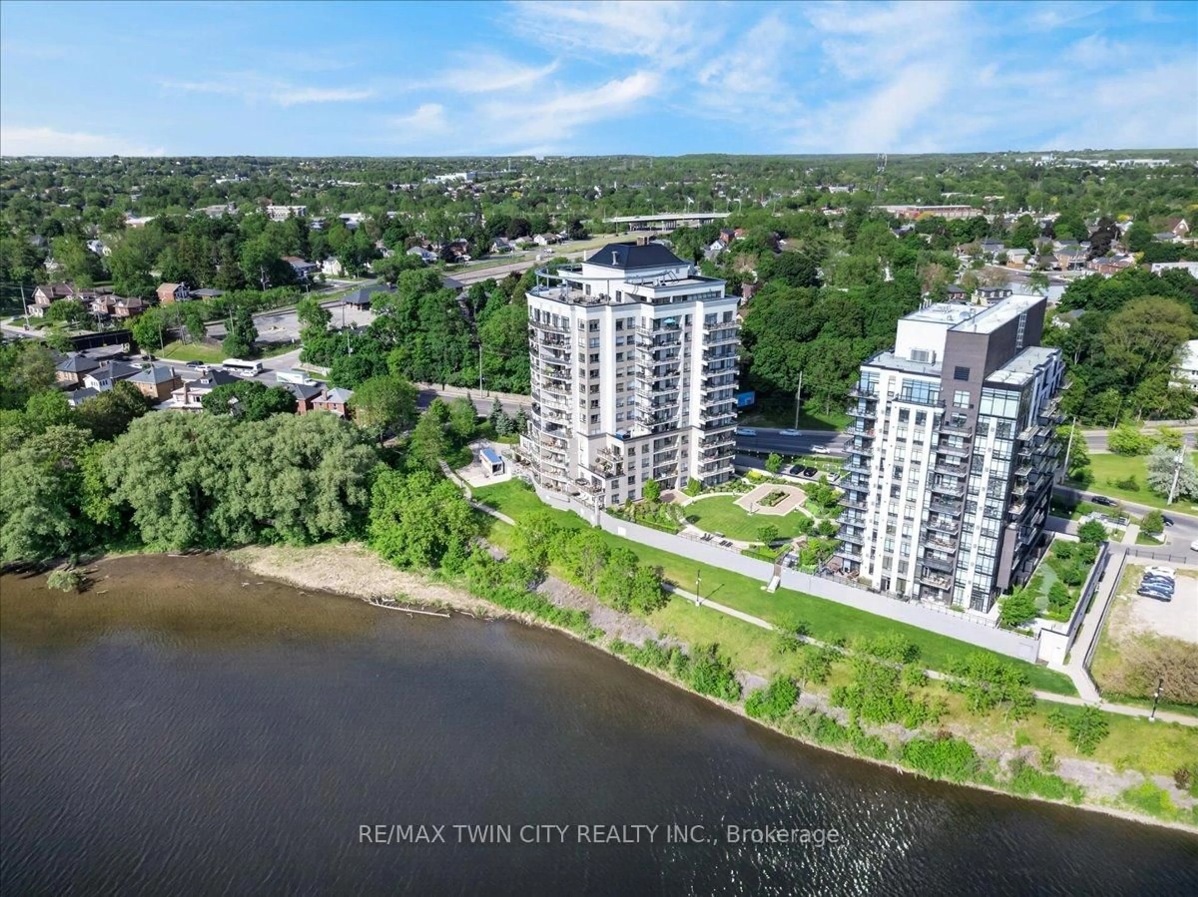 A pic from outside/outdoor area/front of a property/back of a property/a pic from drone, water/lake/river/ocean view for 170 Water St #405, Cambridge Ontario N1R 3B6