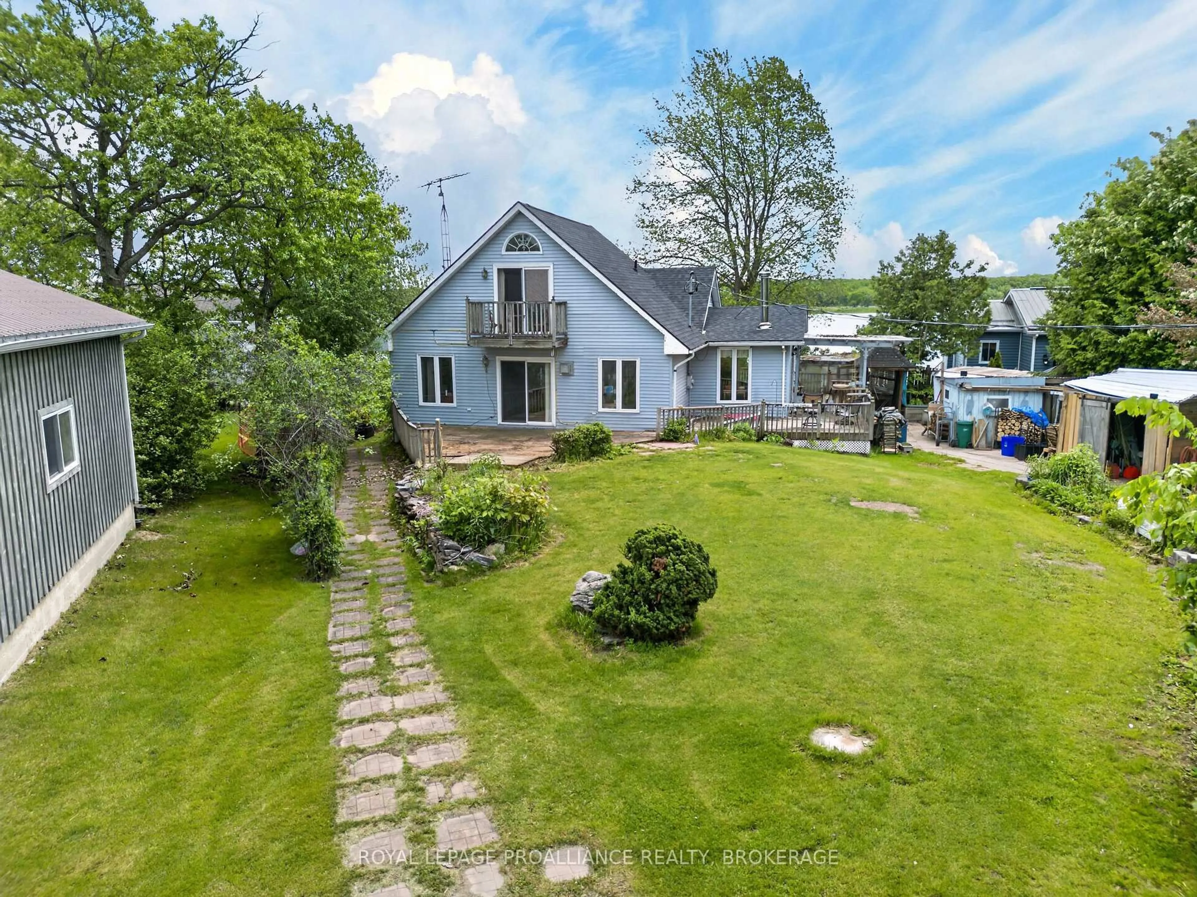 A pic from outside/outdoor area/front of a property/back of a property/a pic from drone, street for 229 Johnson Bay Lane, Gananoque Ontario K7G 2V6