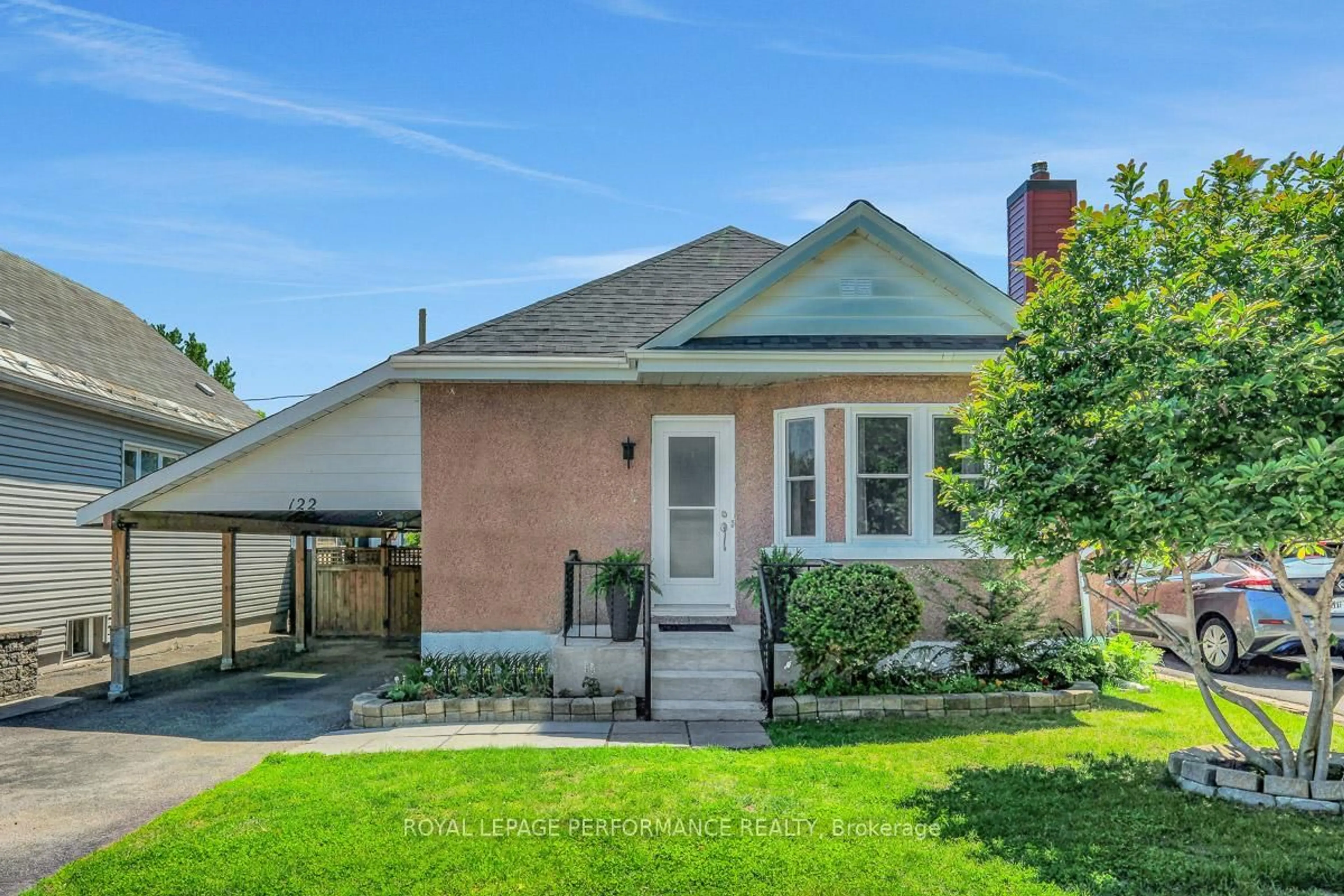 Home with brick exterior material, street for 122 Vachon Ave, Ottawa Ontario K1L 5S8