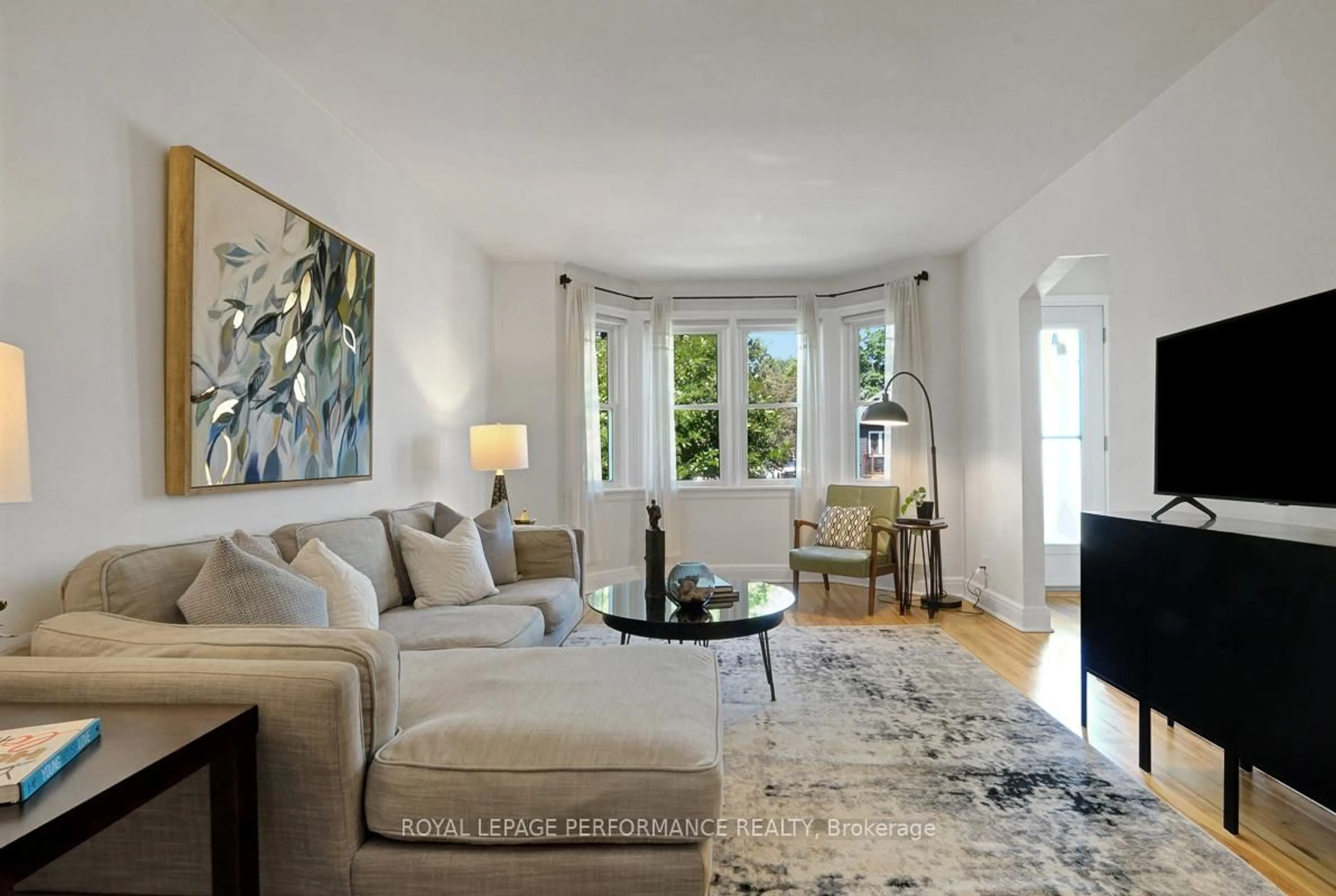 Living room with furniture, unknown for 122 Vachon Ave, Ottawa Ontario K1L 5S8