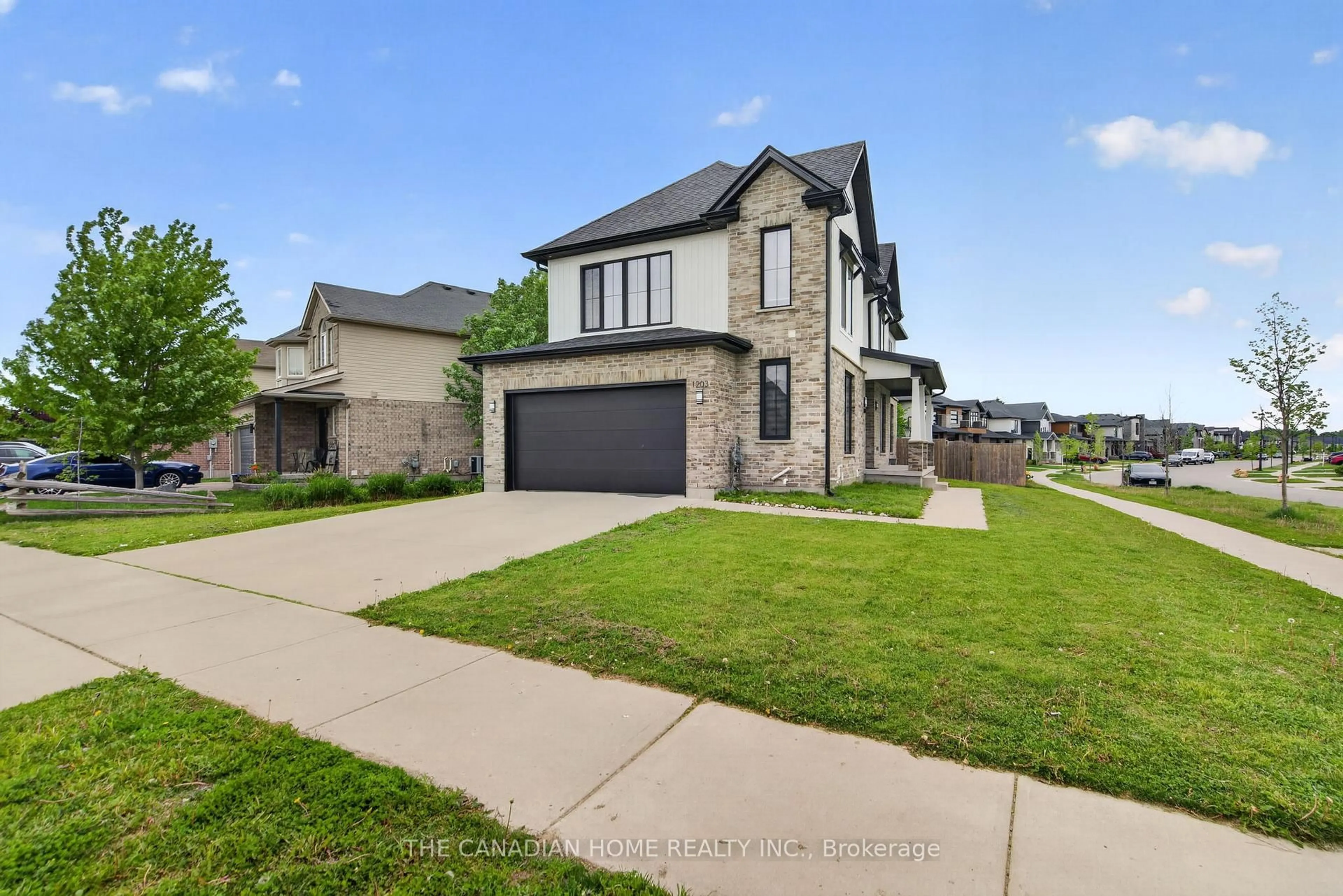 Home with brick exterior material, street for 1203 SILVERFOX Dr, London North Ontario N6G 0V8