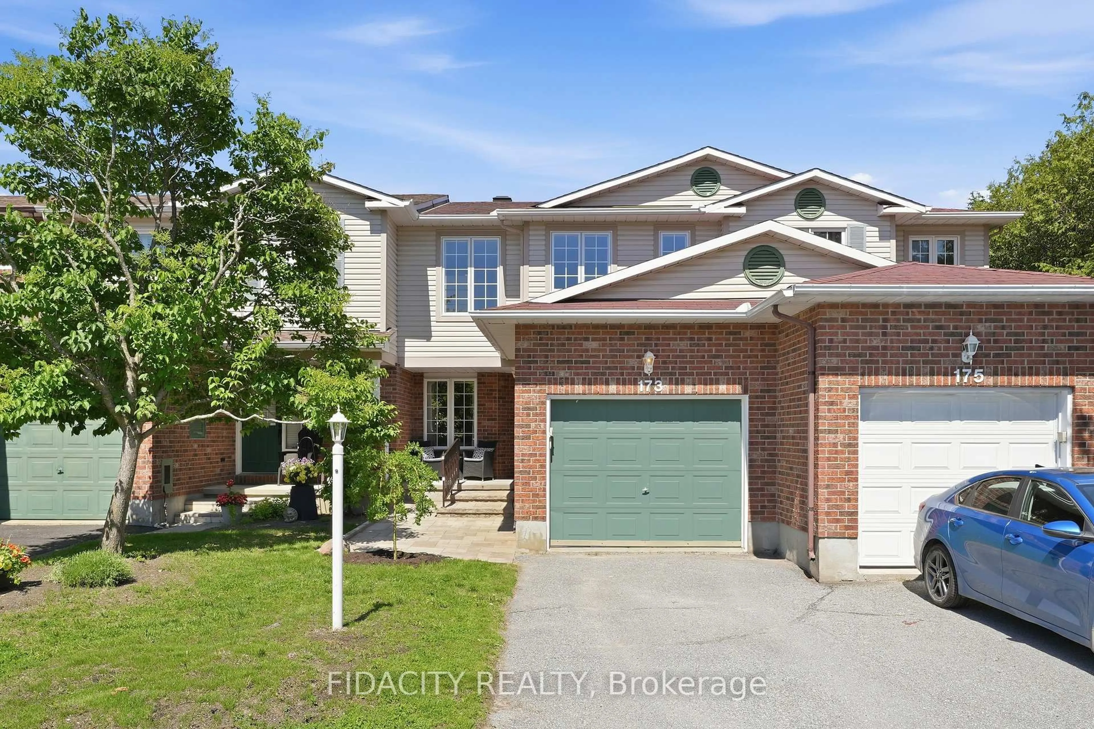 Home with brick exterior material, street for 173 Whalings Circ, Stittsville Ontario K2S 1S4