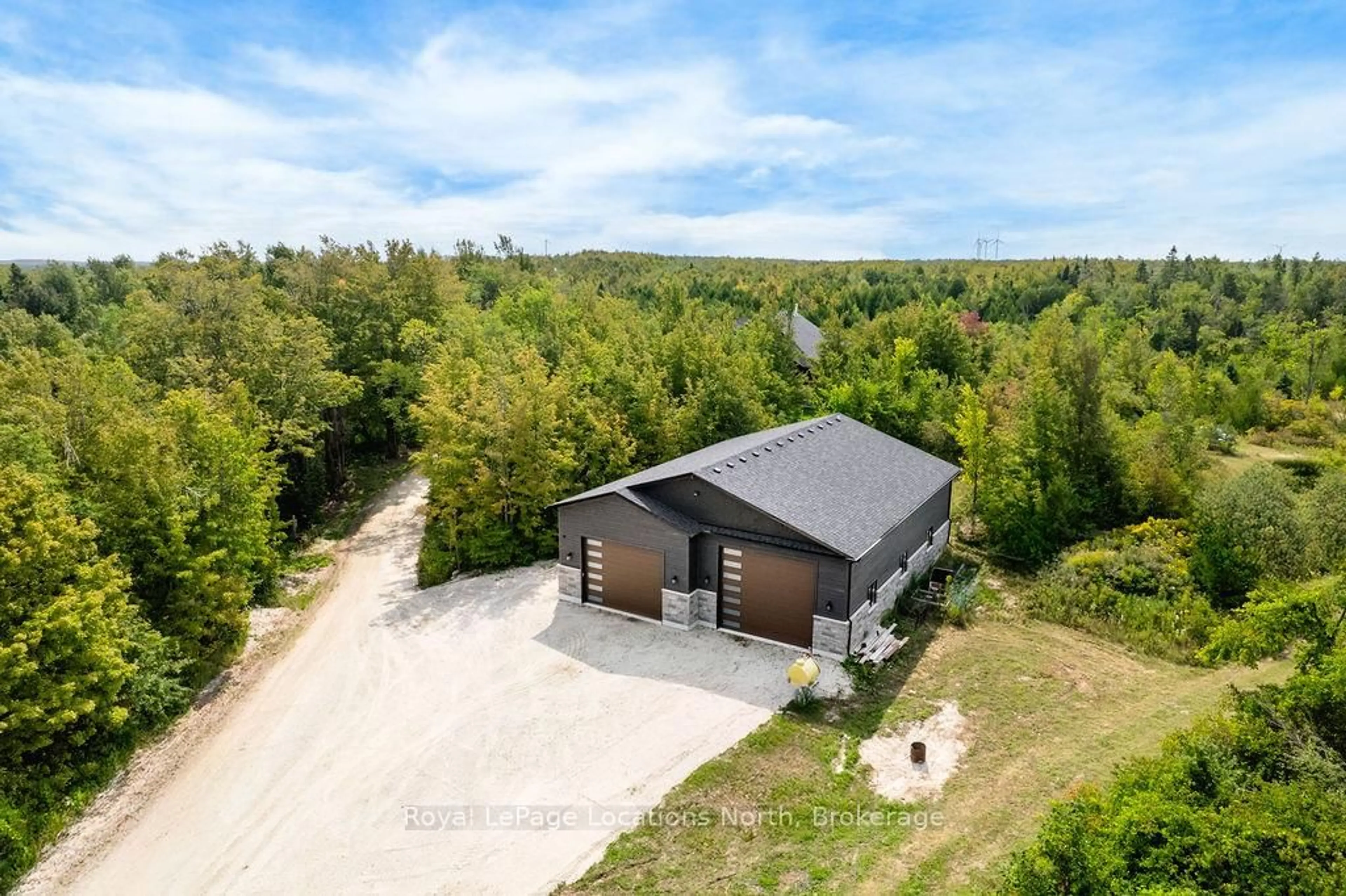 A pic from outside/outdoor area/front of a property/back of a property/a pic from drone, unknown for 429540 8th B Concession, Grey Highlands Ontario N0C 1M0