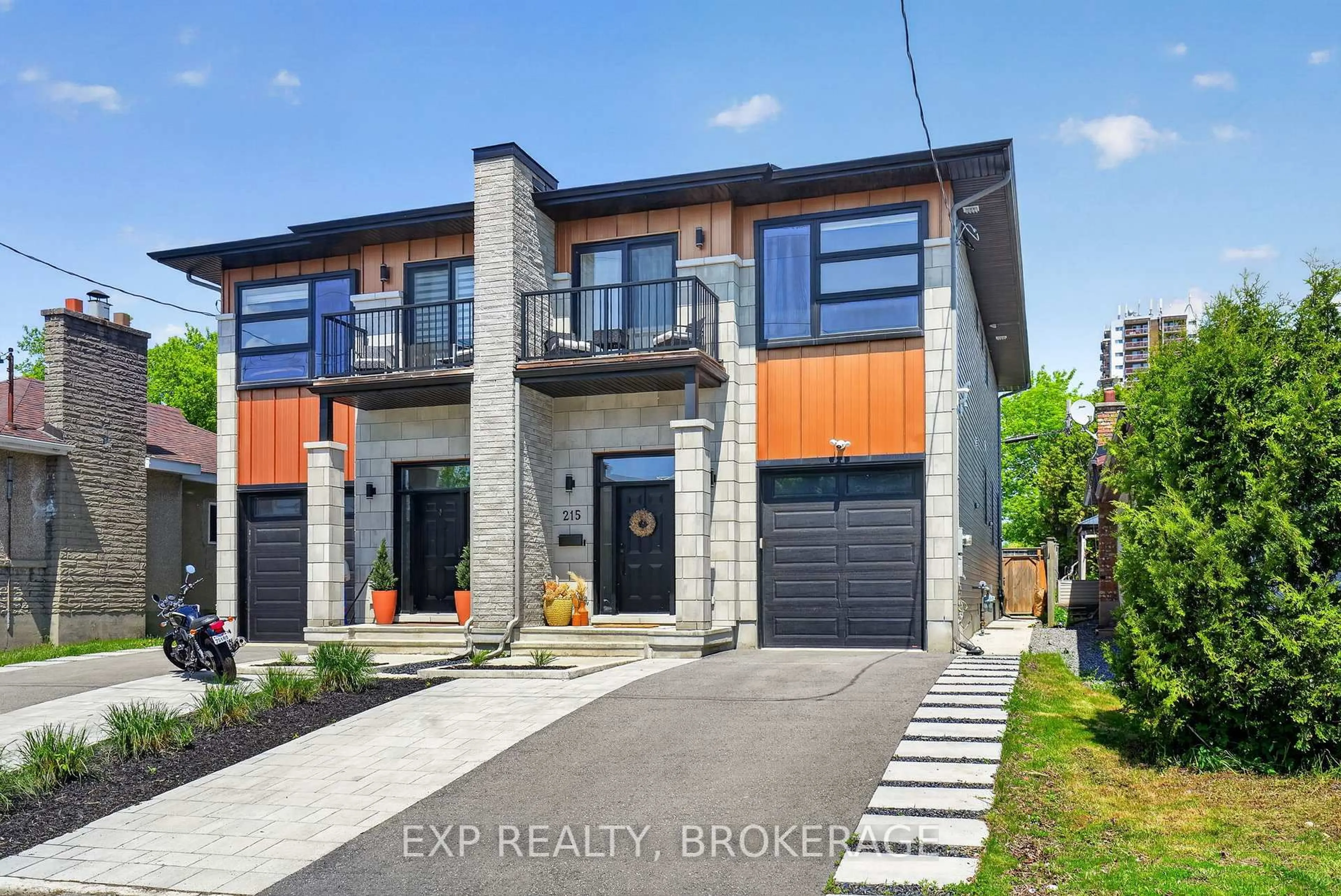 Home with brick exterior material, street for 215 Columbus Ave, Ottawa Ontario K1K 1P7