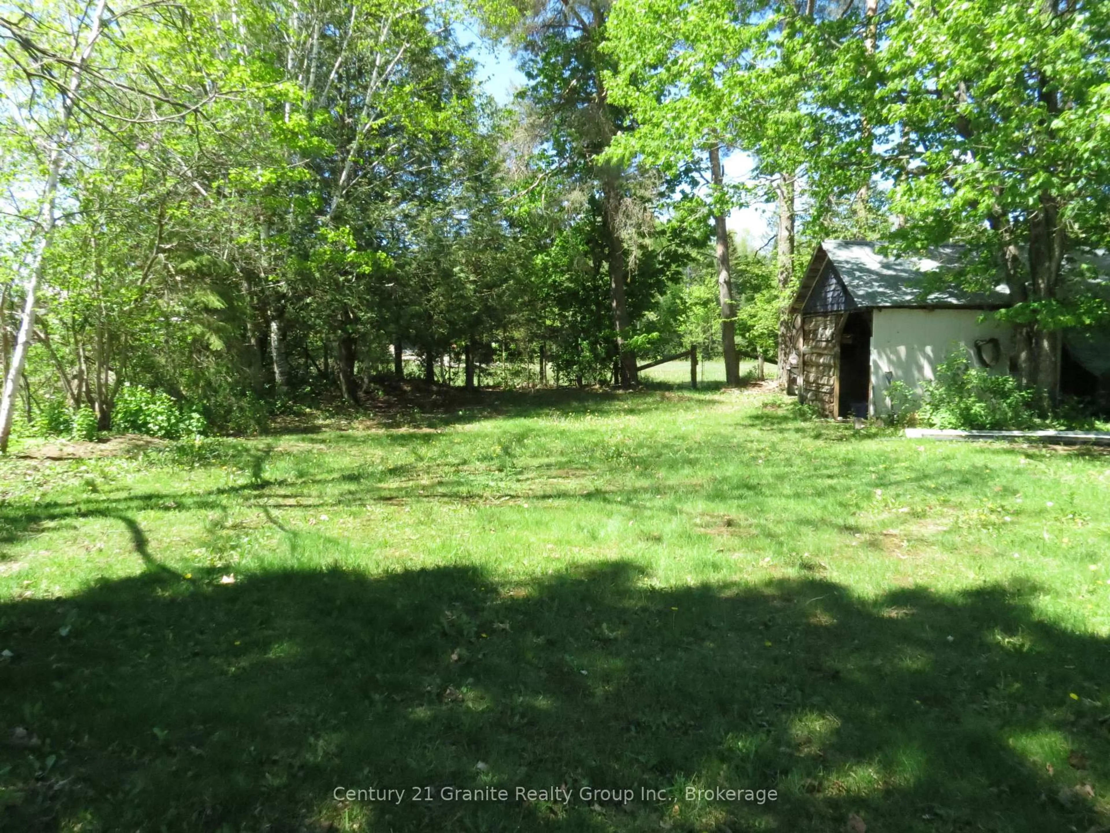 A pic from outside/outdoor area/front of a property/back of a property/a pic from drone, forest/trees view for 2315 Loop Rd, Highlands East Ontario K0L 3C0