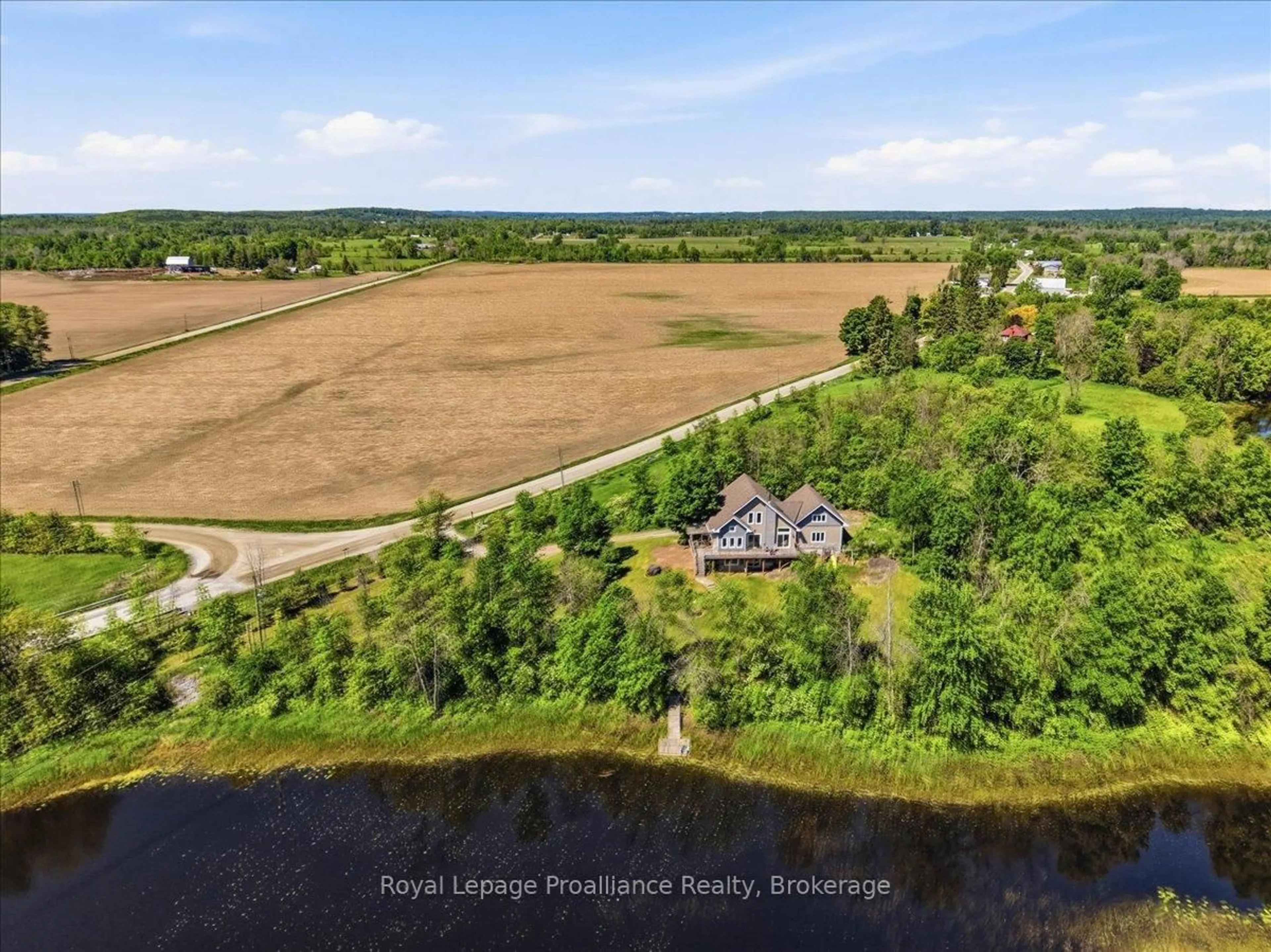 A pic from outside/outdoor area/front of a property/back of a property/a pic from drone, water/lake/river/ocean view for 624 Allore Rd, Tweed Ontario K0K 3J0