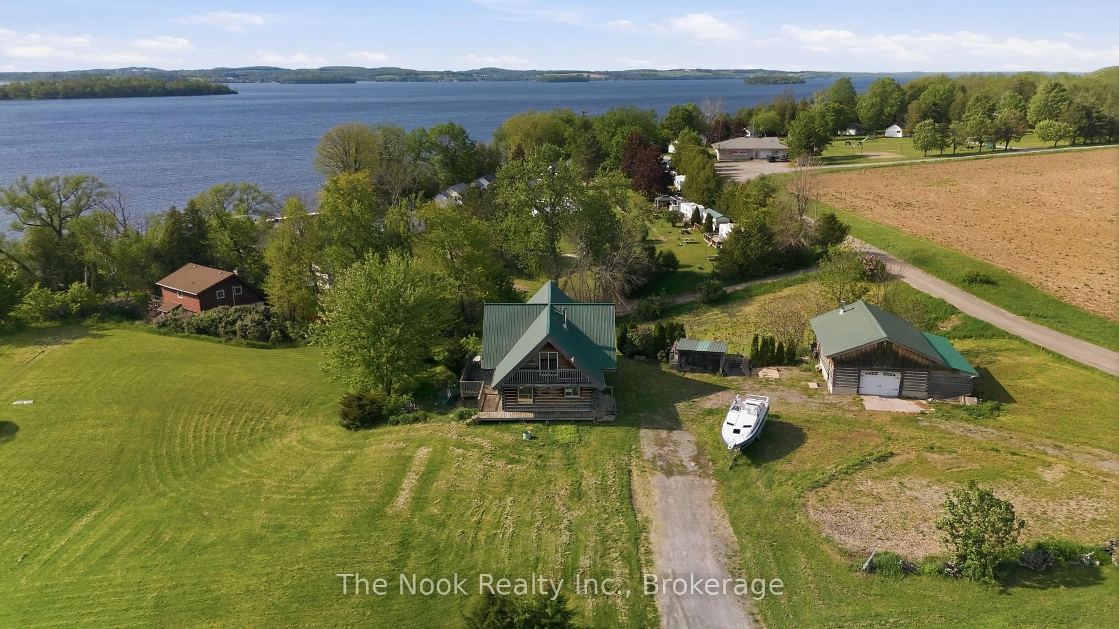 A pic from outside/outdoor area/front of a property/back of a property/a pic from drone, water/lake/river/ocean view for 493 Island View Rd, Alnwick/Haldimand Ontario K0L 1Y0