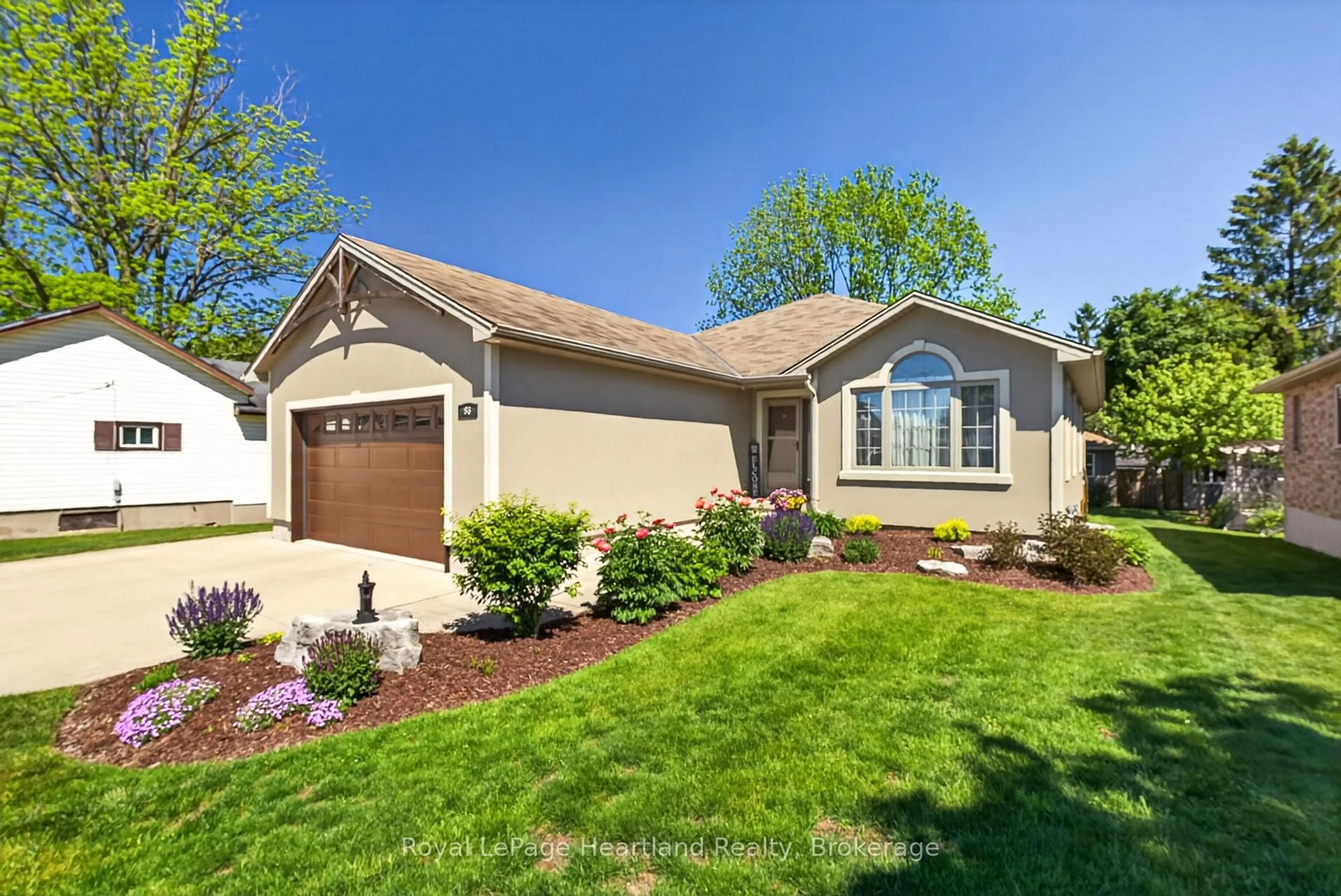 Home with vinyl exterior material, street for 86 Huron St, South Huron Ontario N0M 1S2