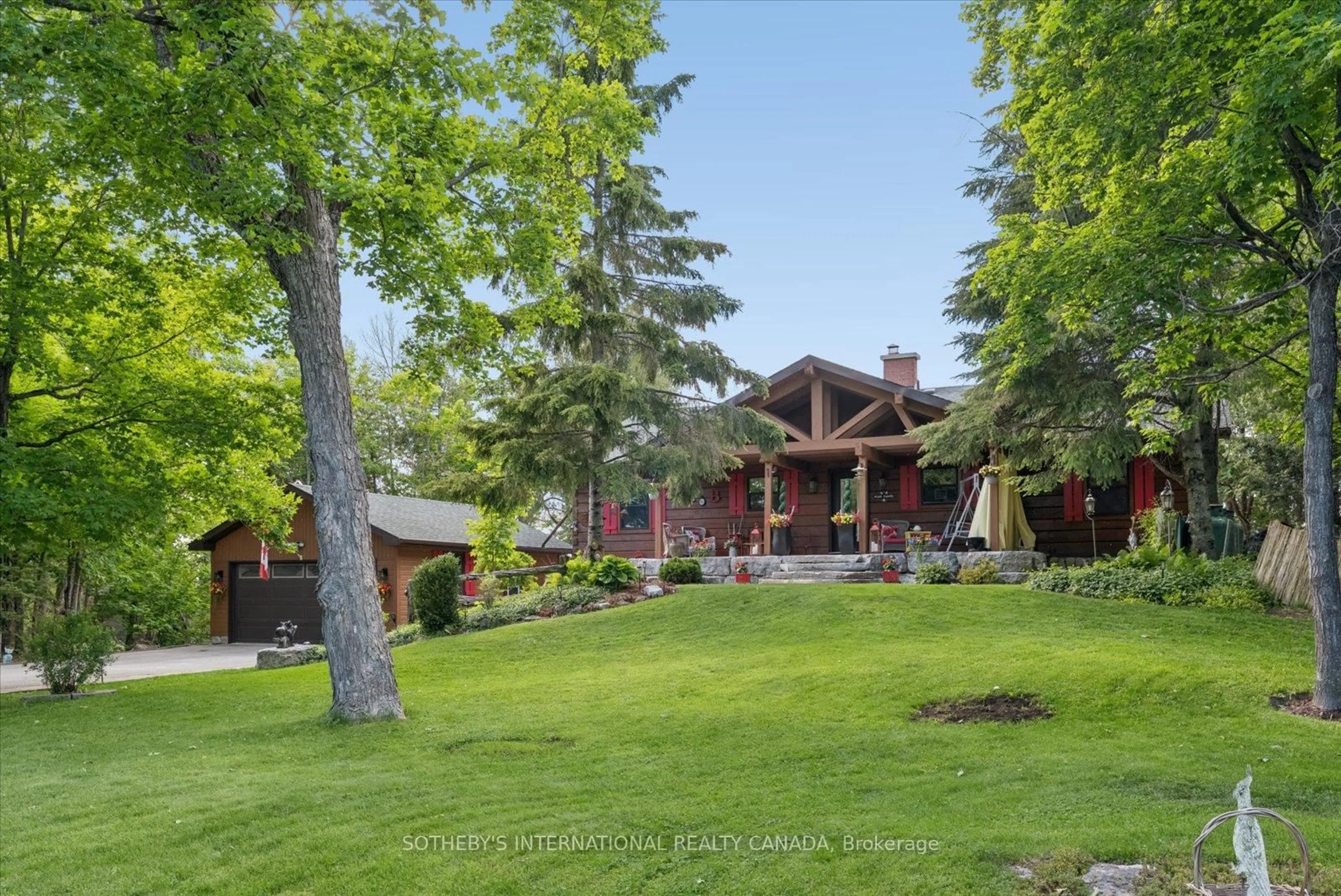 A pic from outside/outdoor area/front of a property/back of a property/a pic from drone, unknown for 124 Fire Route 66, Trent Lakes Ontario K0L 2J0