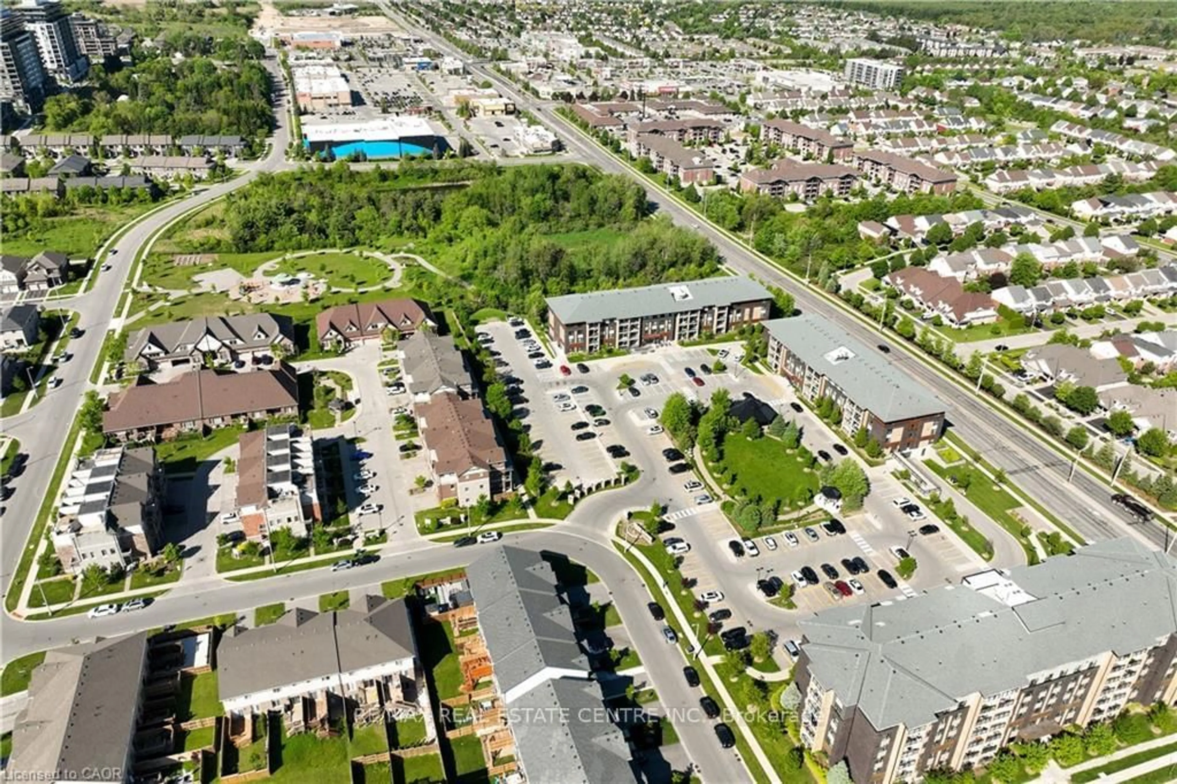 A pic from outside/outdoor area/front of a property/back of a property/a pic from drone, street for 7 Kay Cres #107, Guelph Ontario N1L 0P9