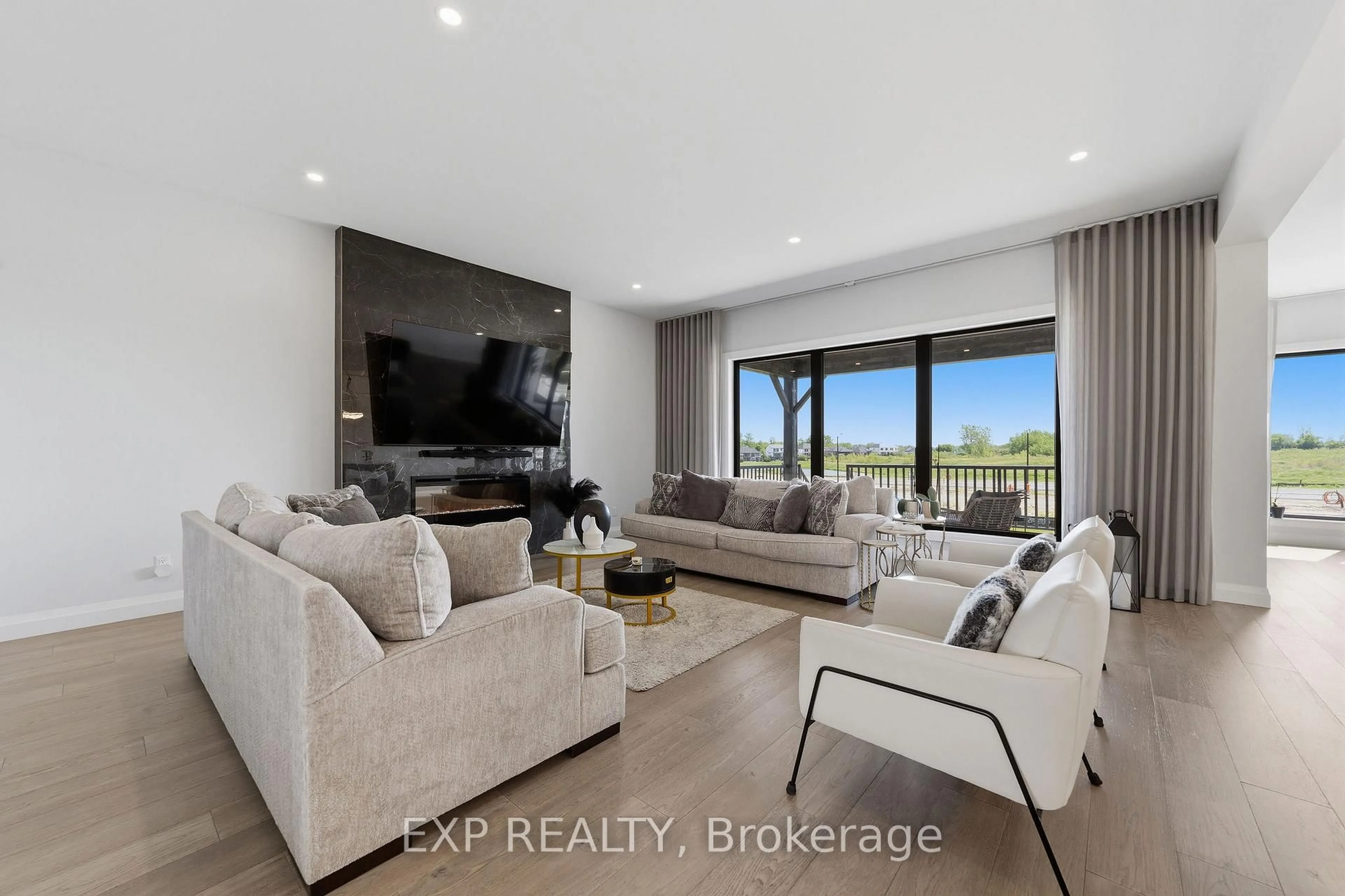 Living room with furniture, unknown for 113 Edgewater Blvd, Middlesex Centre Ontario N0L 1R0