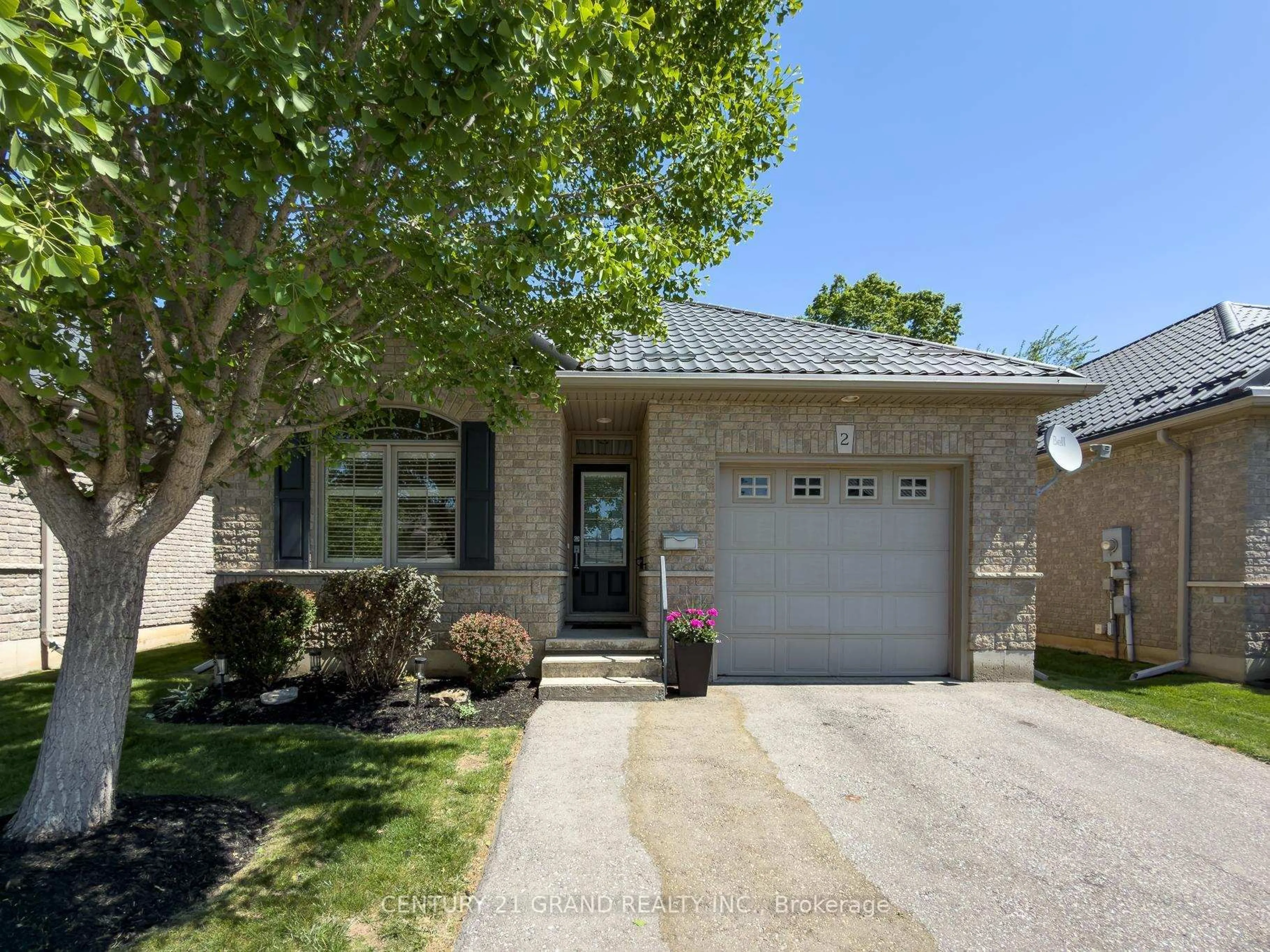 Home with brick exterior material, street for 95 North Park #2, Brantford Ontario N3R 4K2