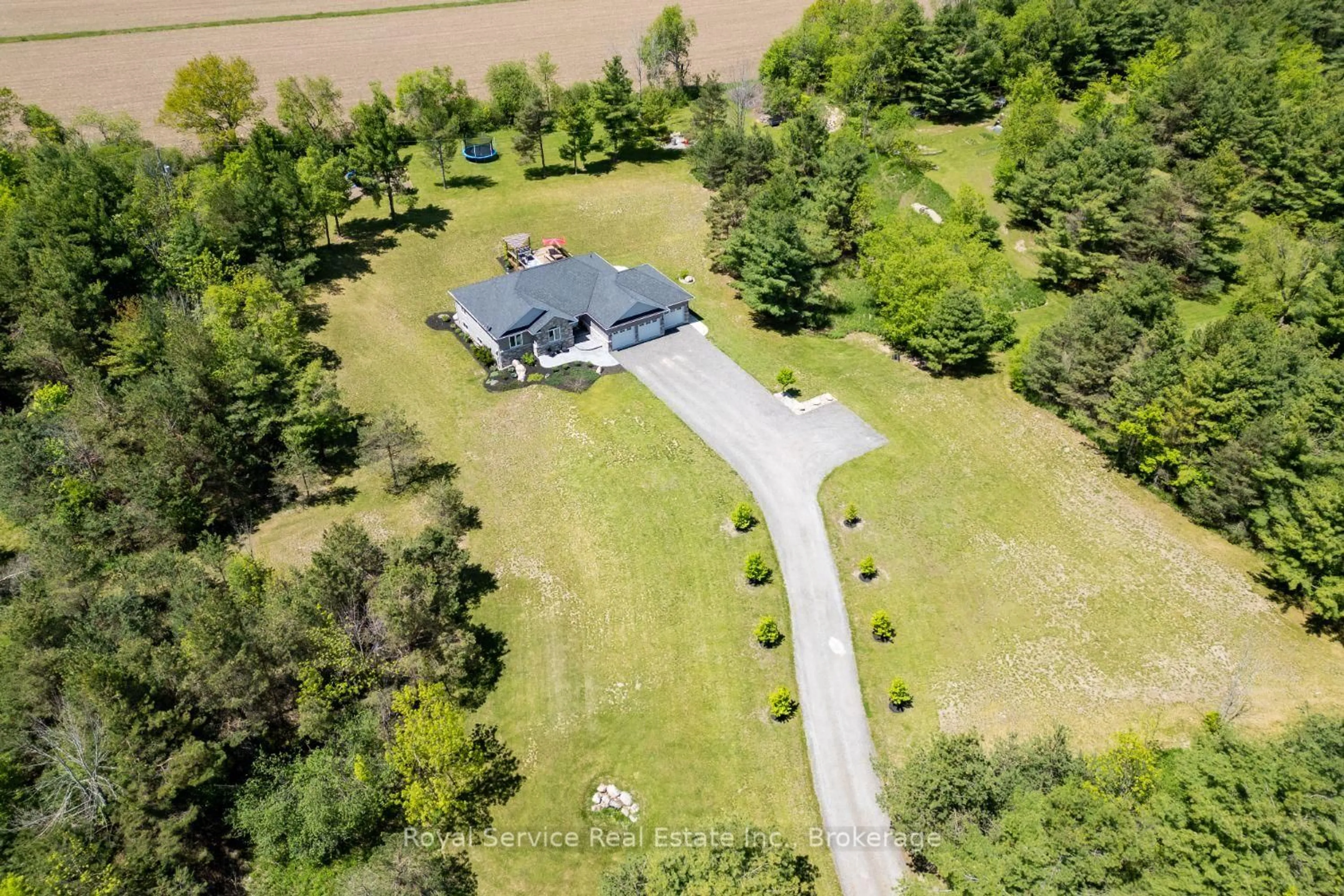 A pic from outside/outdoor area/front of a property/back of a property/a pic from drone, unknown for 130 County 10 Rd, Cavan Monaghan Ontario L0A 1G0
