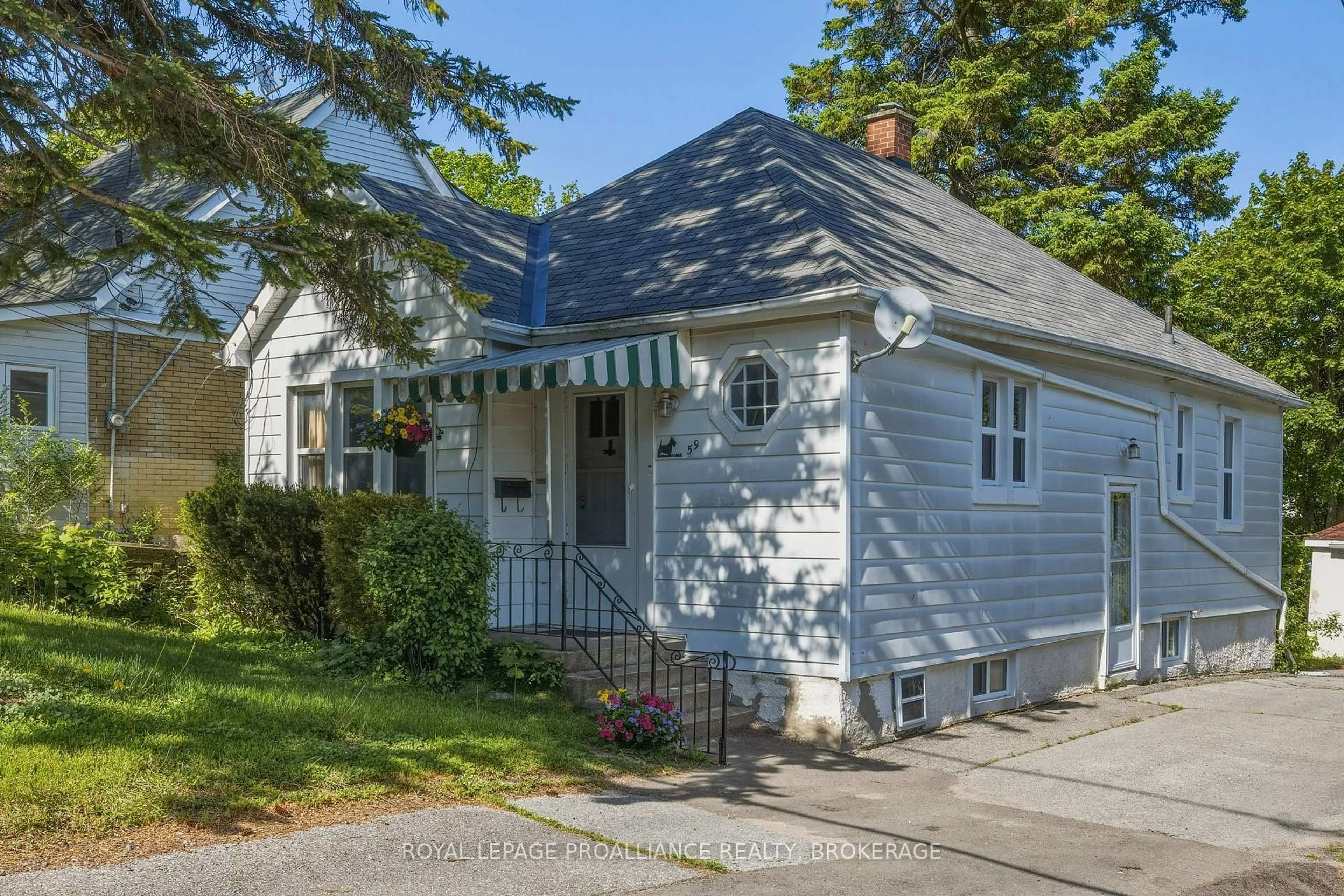 Home with vinyl exterior material, street for 59 Beverley St, Kingston Ontario K7L 3Y5