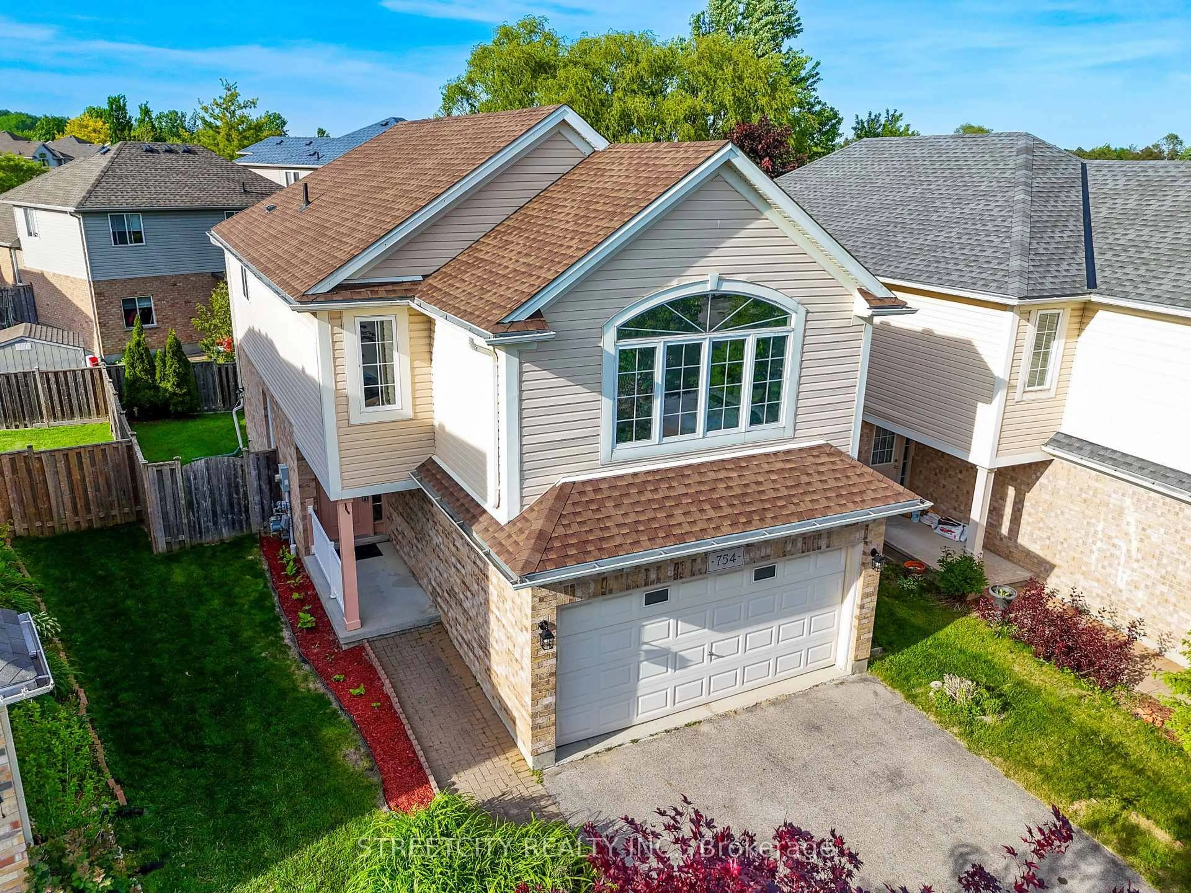 A pic from outside/outdoor area/front of a property/back of a property/a pic from drone, street for 754 Hedgerow Pl, London North Ontario N5X 4L6