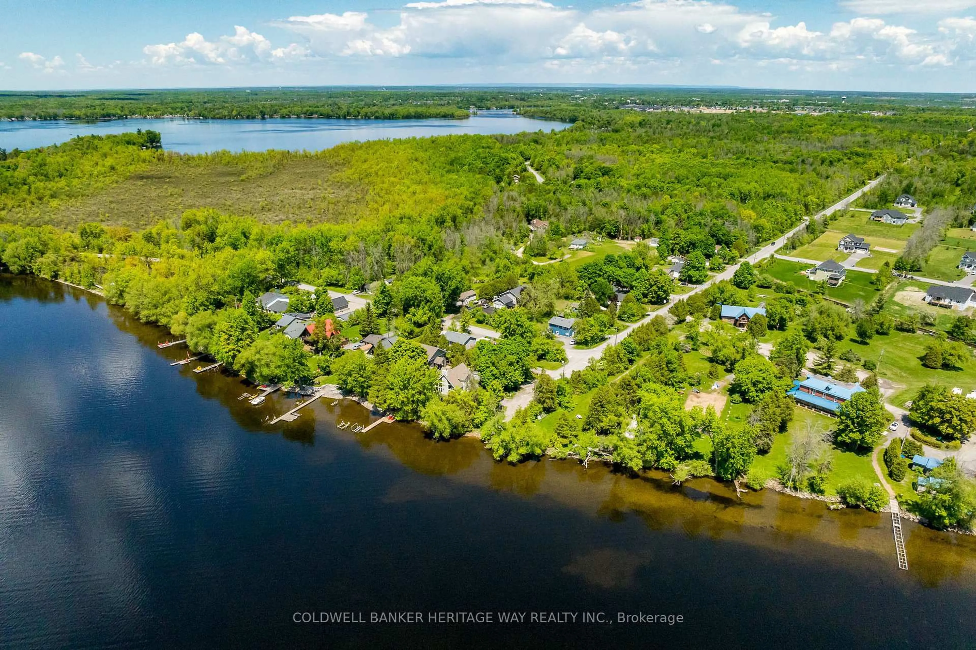 A pic from outside/outdoor area/front of a property/back of a property/a pic from drone, water/lake/river/ocean view for 740 Lake Park Rd, Carleton Place Ontario K7C 3P2