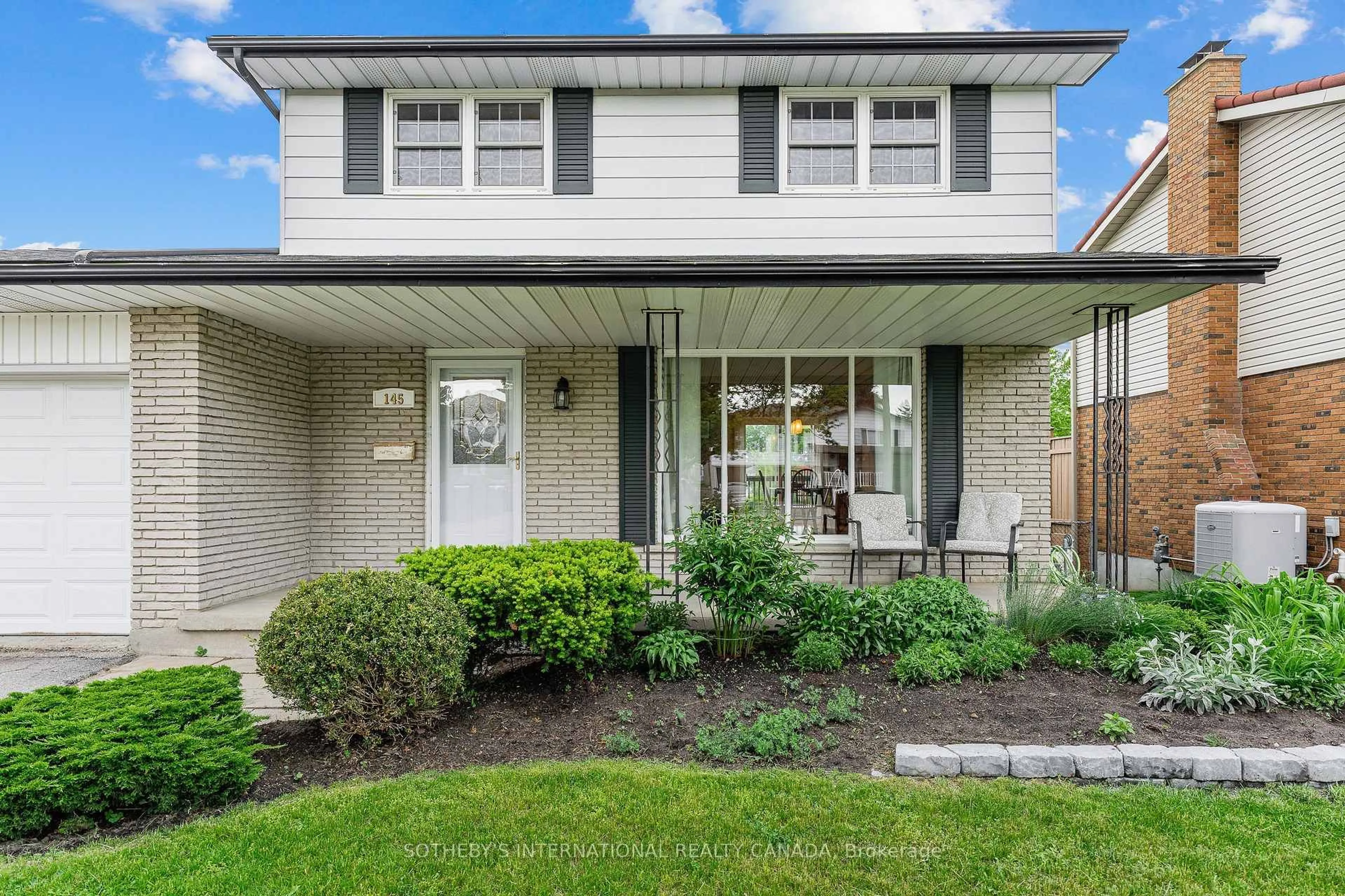 Home with vinyl exterior material, street for 145 Westchester Dr, Kitchener Ontario N2B 3L6