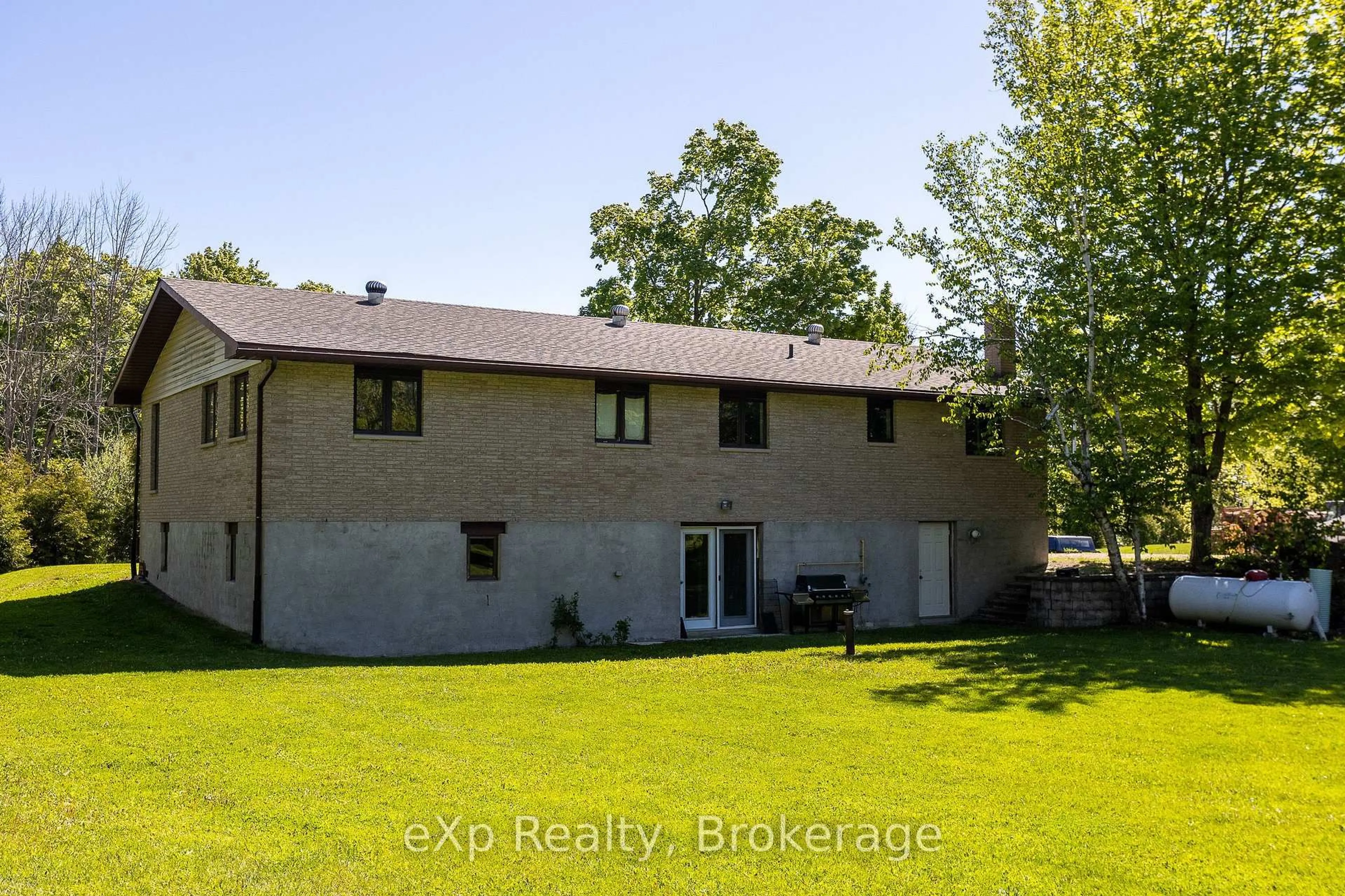 A pic from outside/outdoor area/front of a property/back of a property/a pic from drone, unknown for 117 East Rd, Northern Bruce Peninsula Ontario N0H 1W0