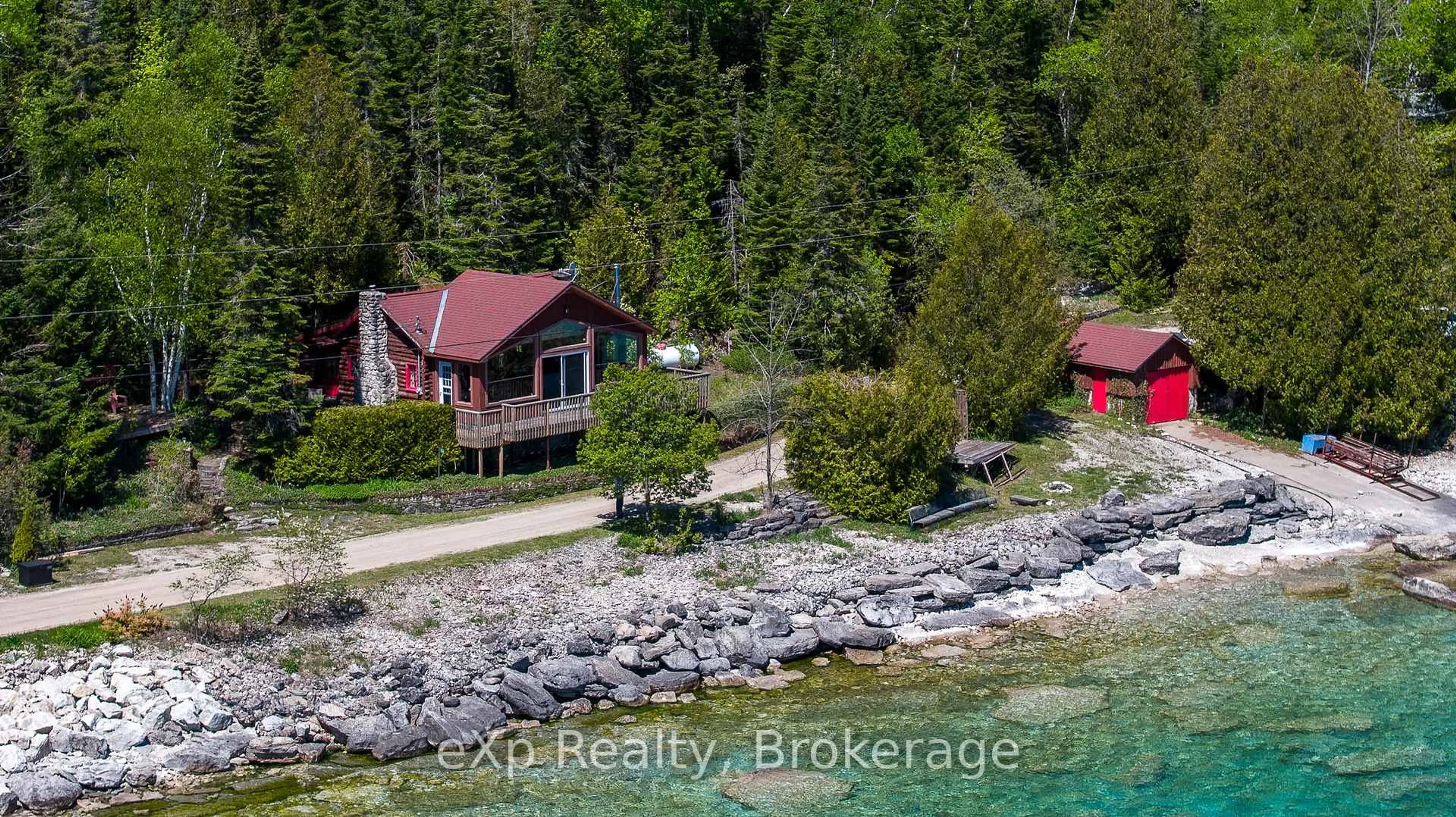A pic from outside/outdoor area/front of a property/back of a property/a pic from drone, water/lake/river/ocean view for 155 North Shore Rd, Northern Bruce Peninsula Ontario N0H 1W0
