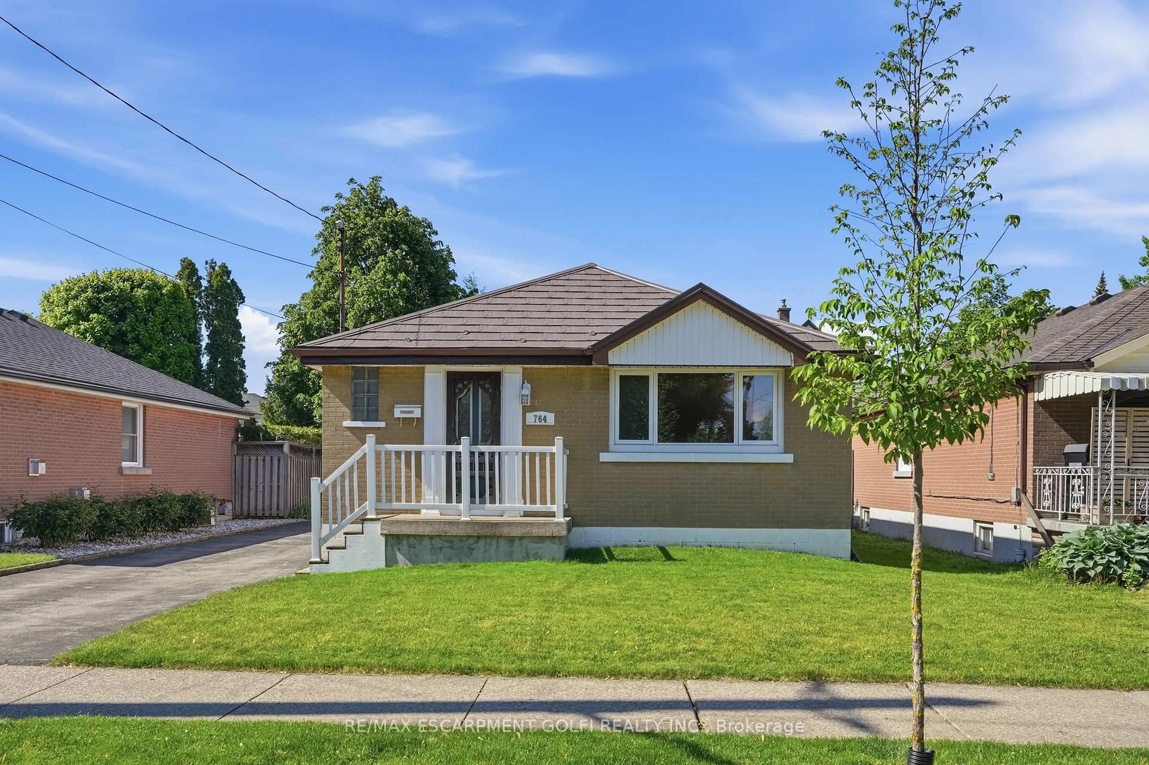 Home with brick exterior material, street for 764 Brucedale Ave, Hamilton Ontario L8V 1R9