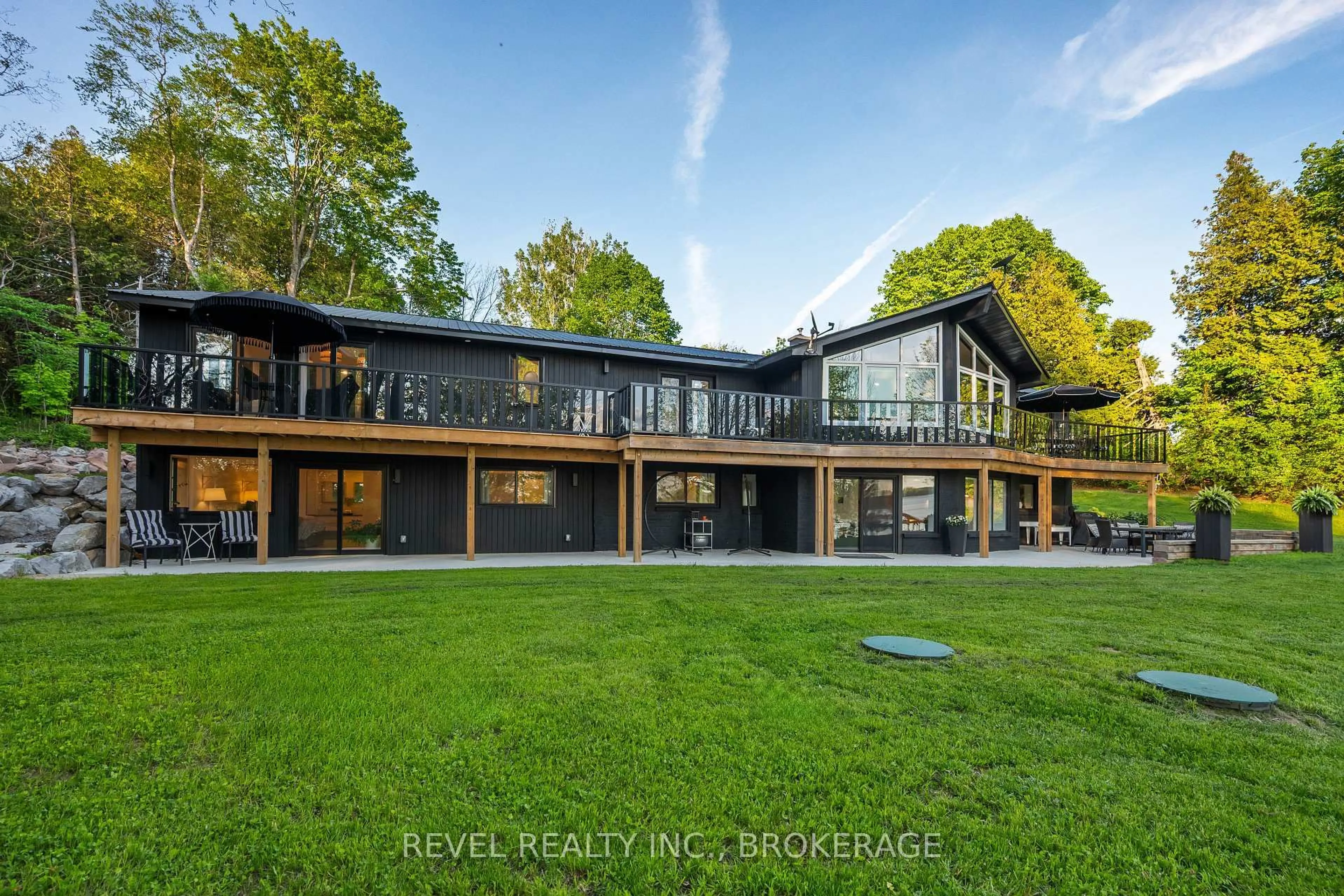 A pic from outside/outdoor area/front of a property/back of a property/a pic from drone, water/lake/river/ocean view for 98 Juniper Lane, Tamworth Ontario K0K 3G0