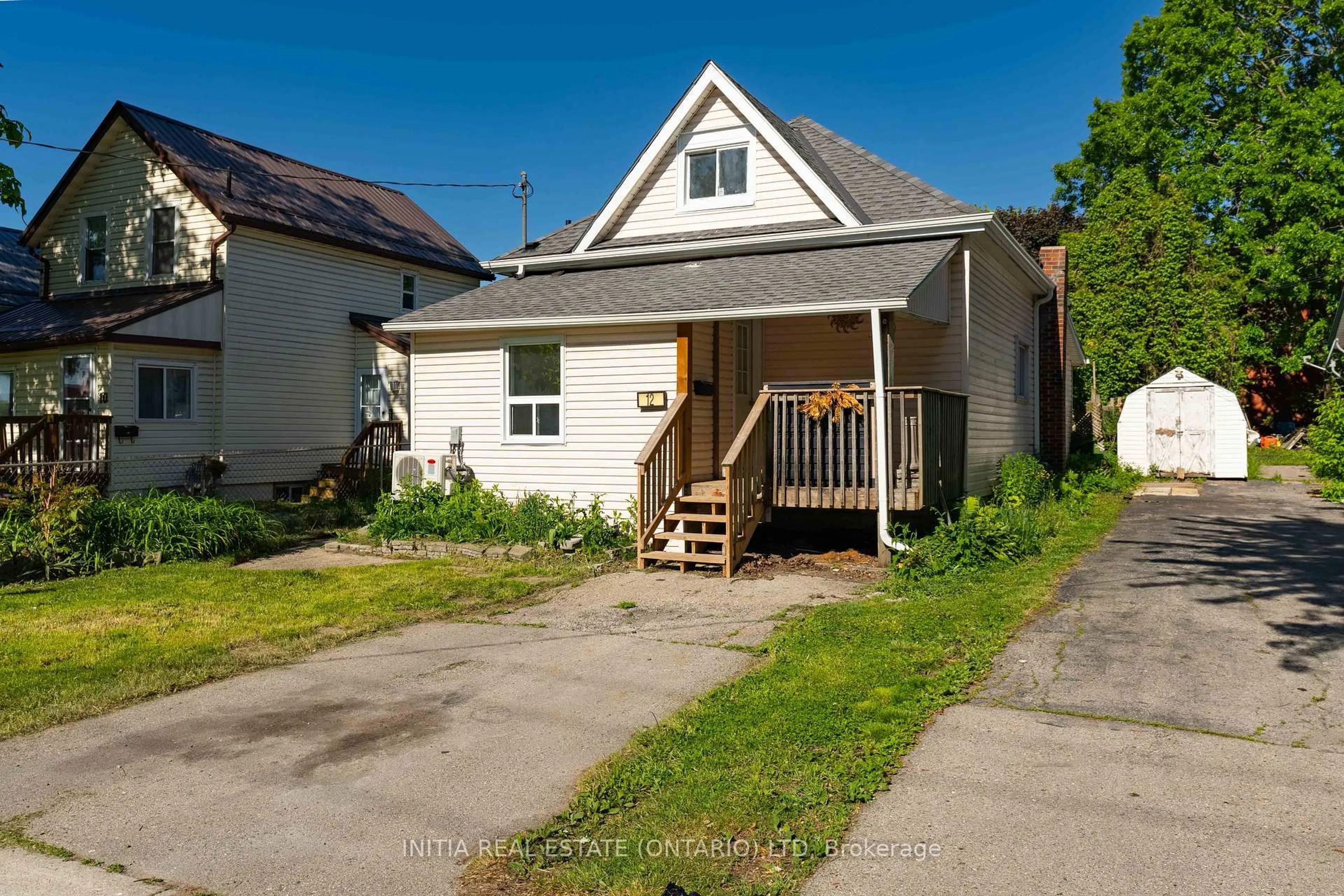 A pic from outside/outdoor area/front of a property/back of a property/a pic from drone, street for 12 Woodworth Ave, St. Thomas Ontario N5P 3J2