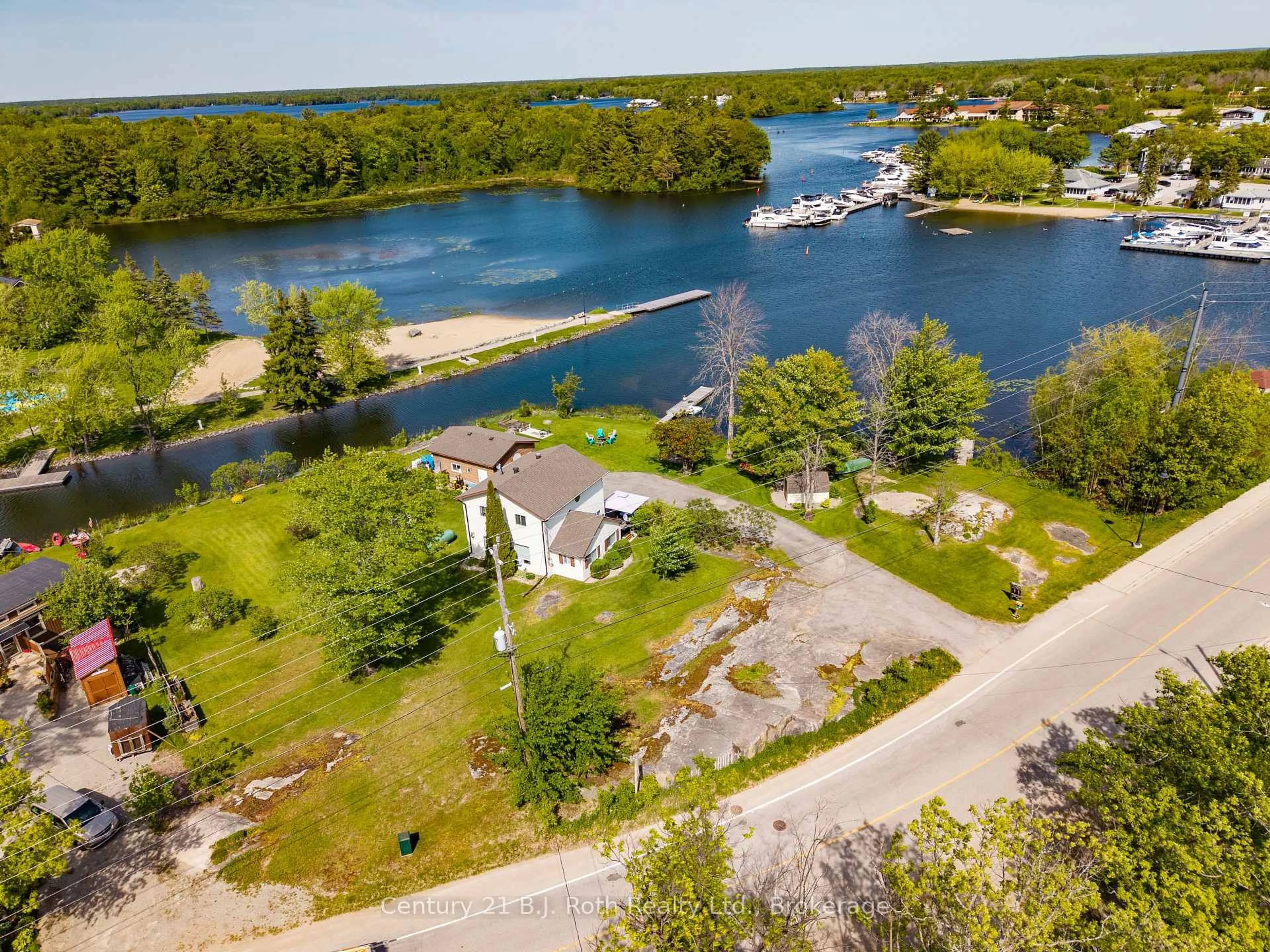 A pic from outside/outdoor area/front of a property/back of a property/a pic from drone, water/lake/river/ocean view for 57 Port Severn Rd, Georgian Bay Ontario L0K 1S0