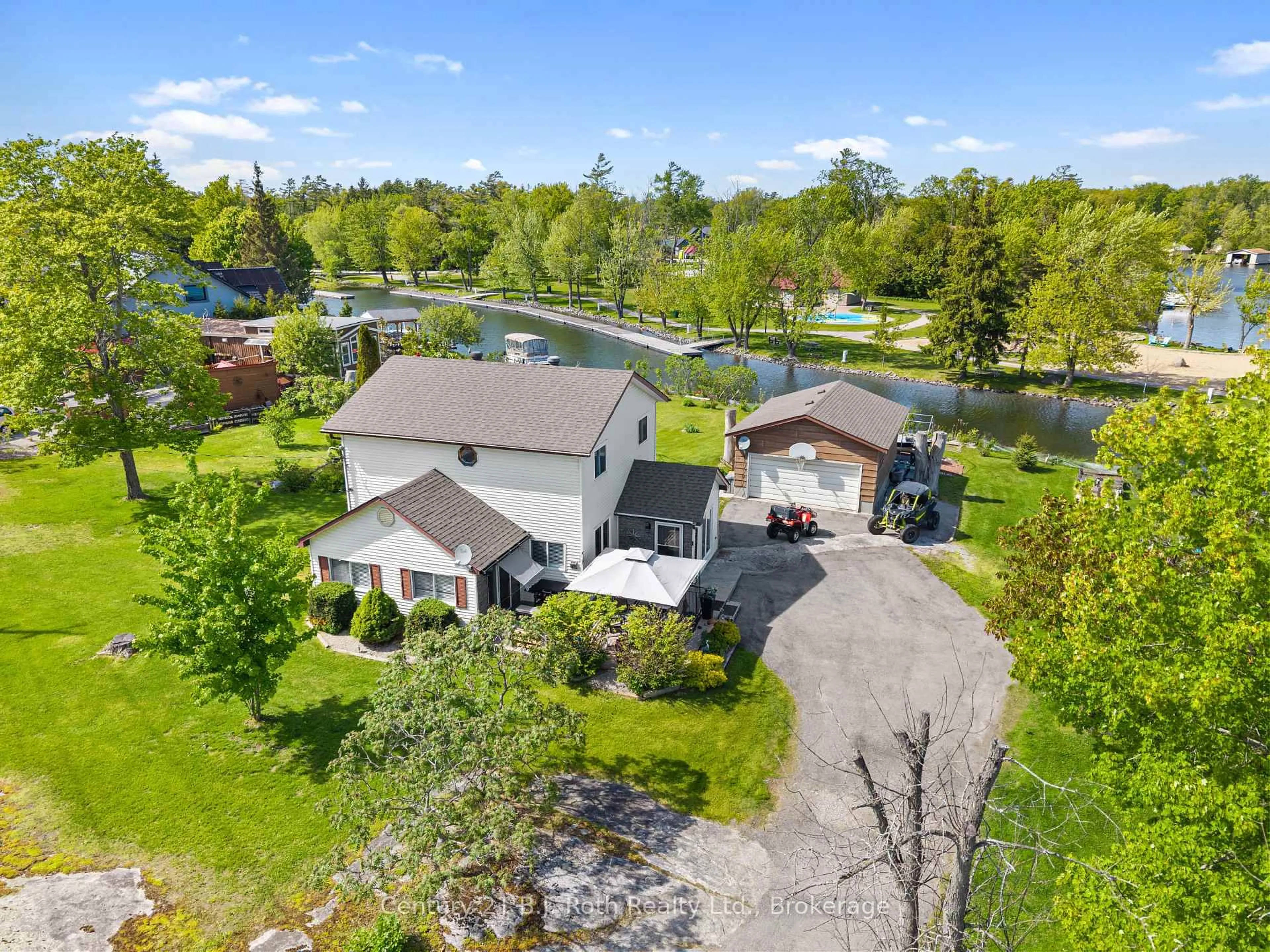 A pic from outside/outdoor area/front of a property/back of a property/a pic from drone, street for 57 Port Severn Rd, Georgian Bay Ontario L0K 1S0