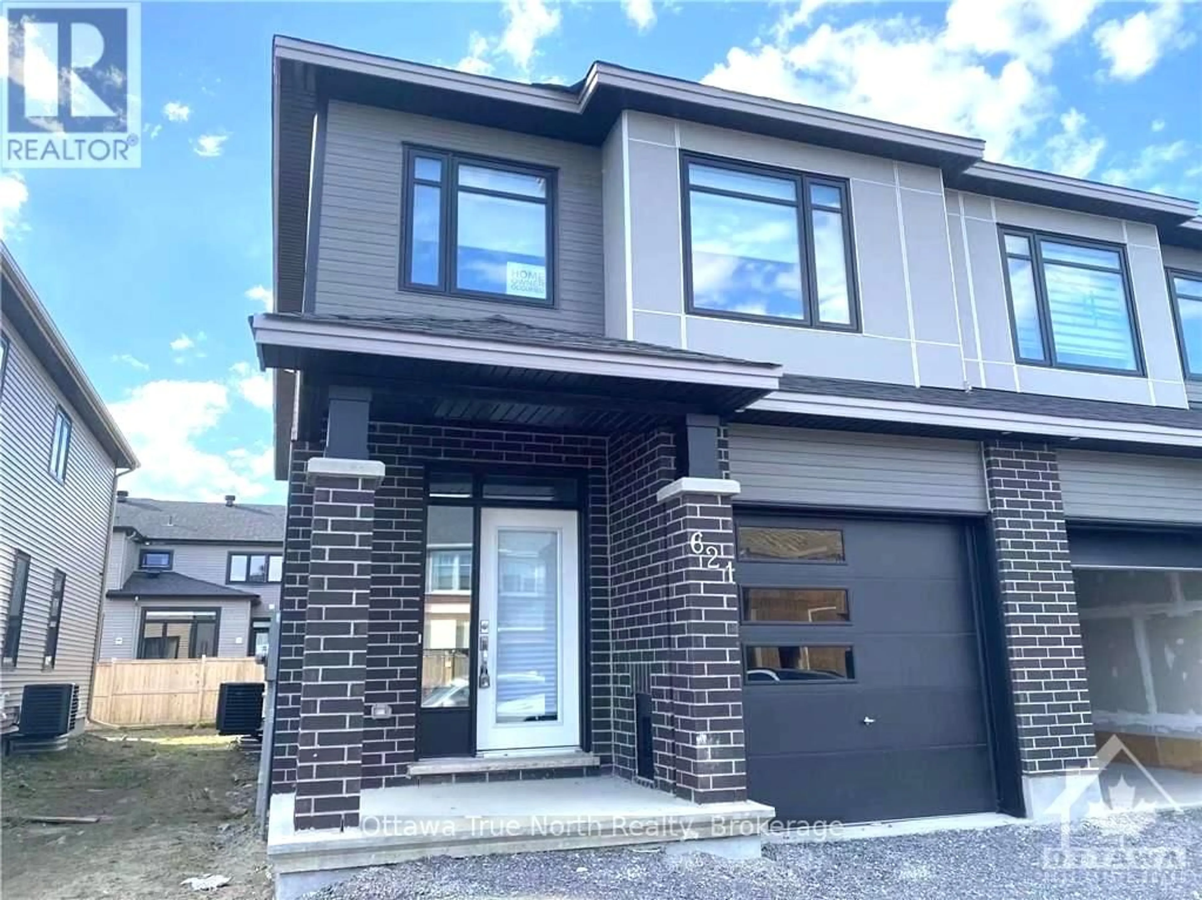Home with brick exterior material, street for 621 Taliesin Cres, Ottawa Ontario K2S 2W5
