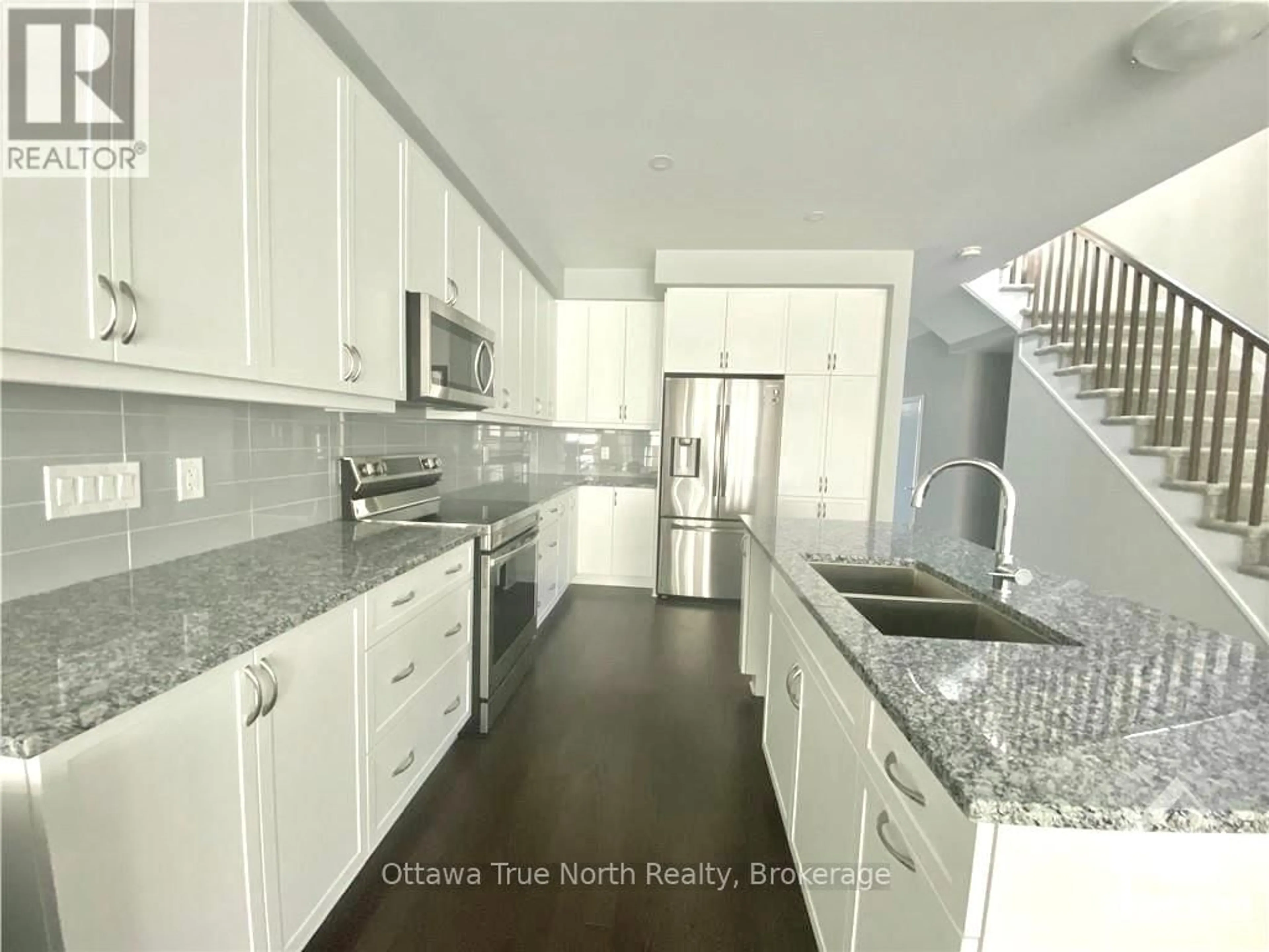 Open concept kitchen, ceramic/tile floor for 621 Taliesin Cres, Ottawa Ontario K2S 2W5