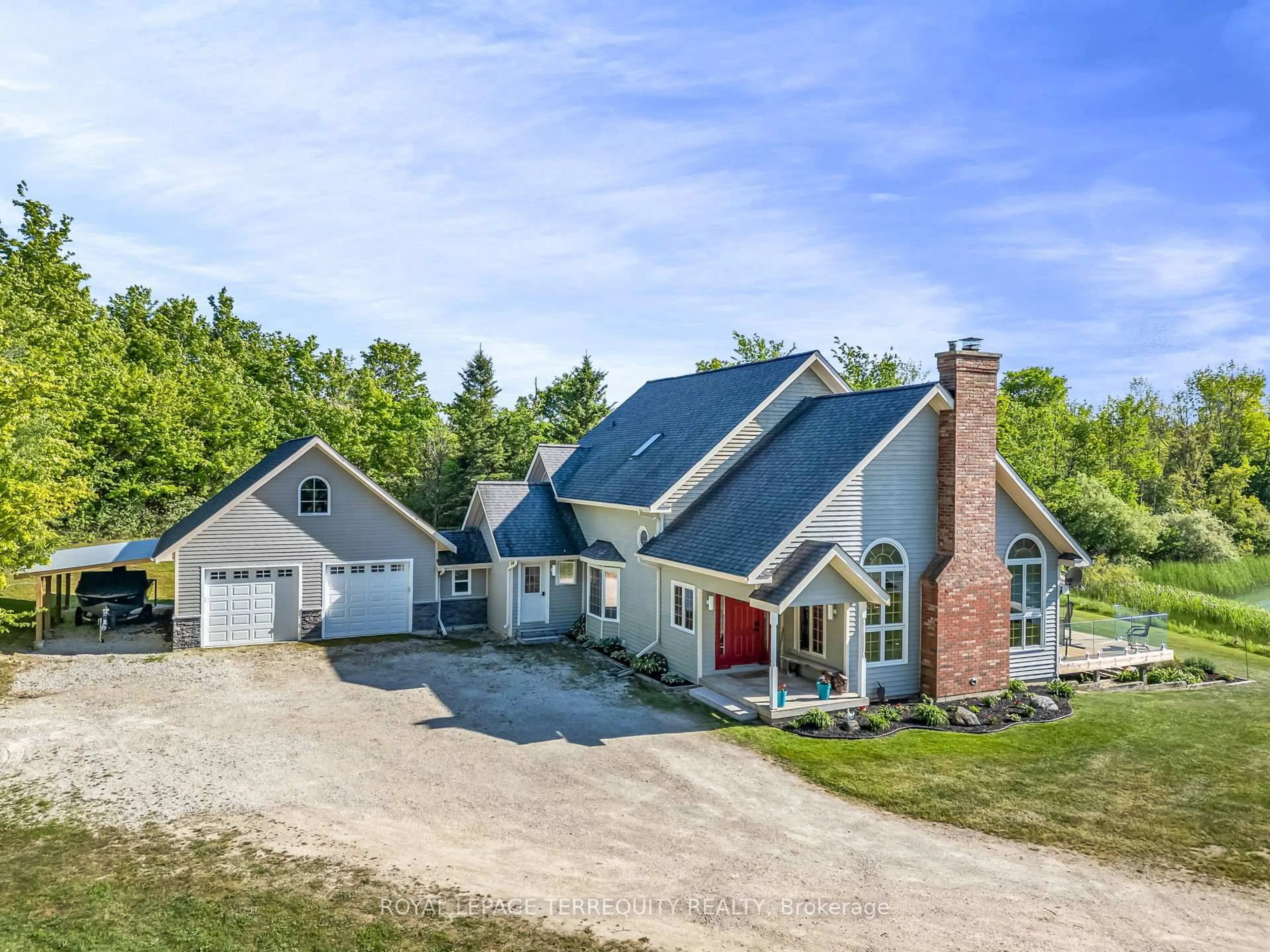 A pic from outside/outdoor area/front of a property/back of a property/a pic from drone, street for 516452 7th Line, Blue Mountains Ontario N0H 1J0