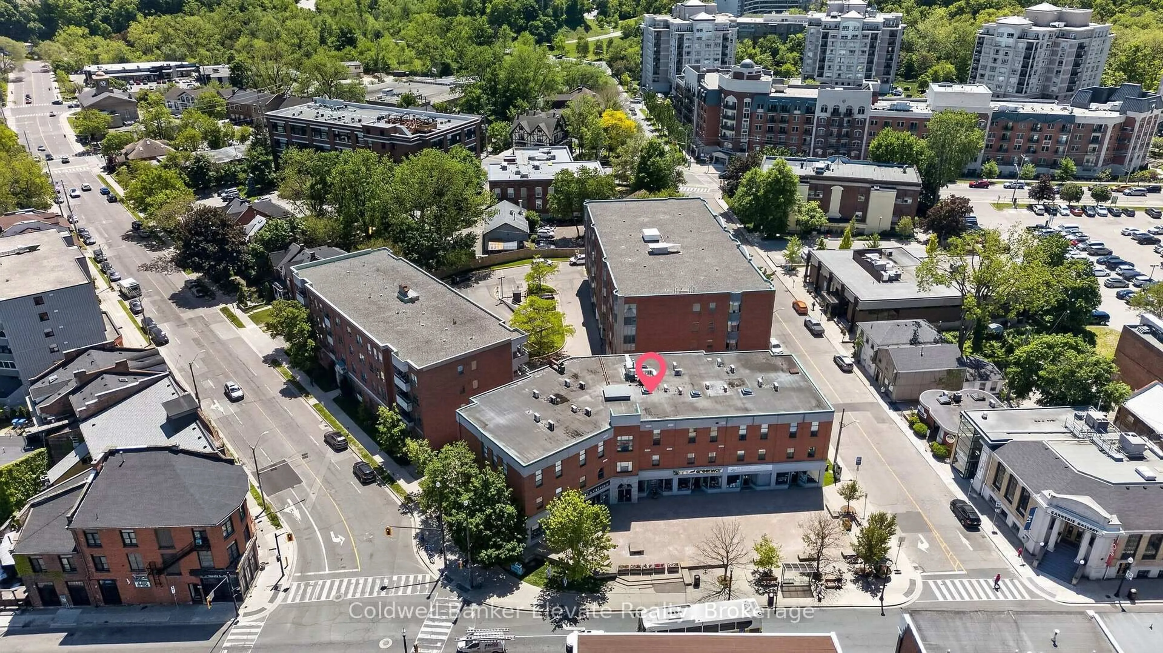 A pic from outside/outdoor area/front of a property/back of a property/a pic from drone, building for 2 King St #205, Hamilton Ontario L9H 6Z1