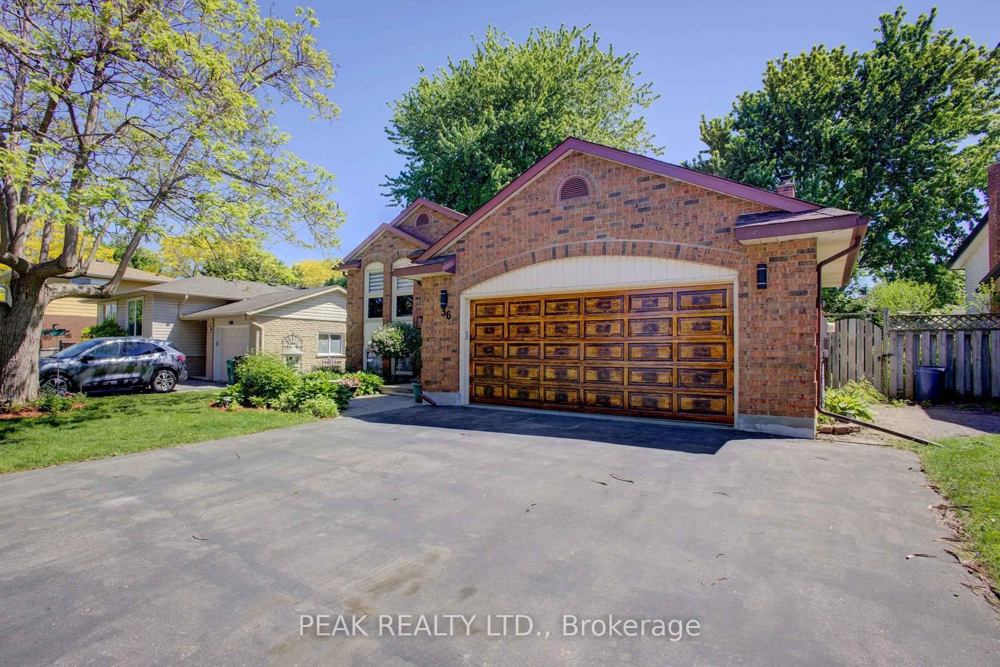 Home with brick exterior material, street for 36 Westchester Dr, Kitchener Ontario N2B 1W7
