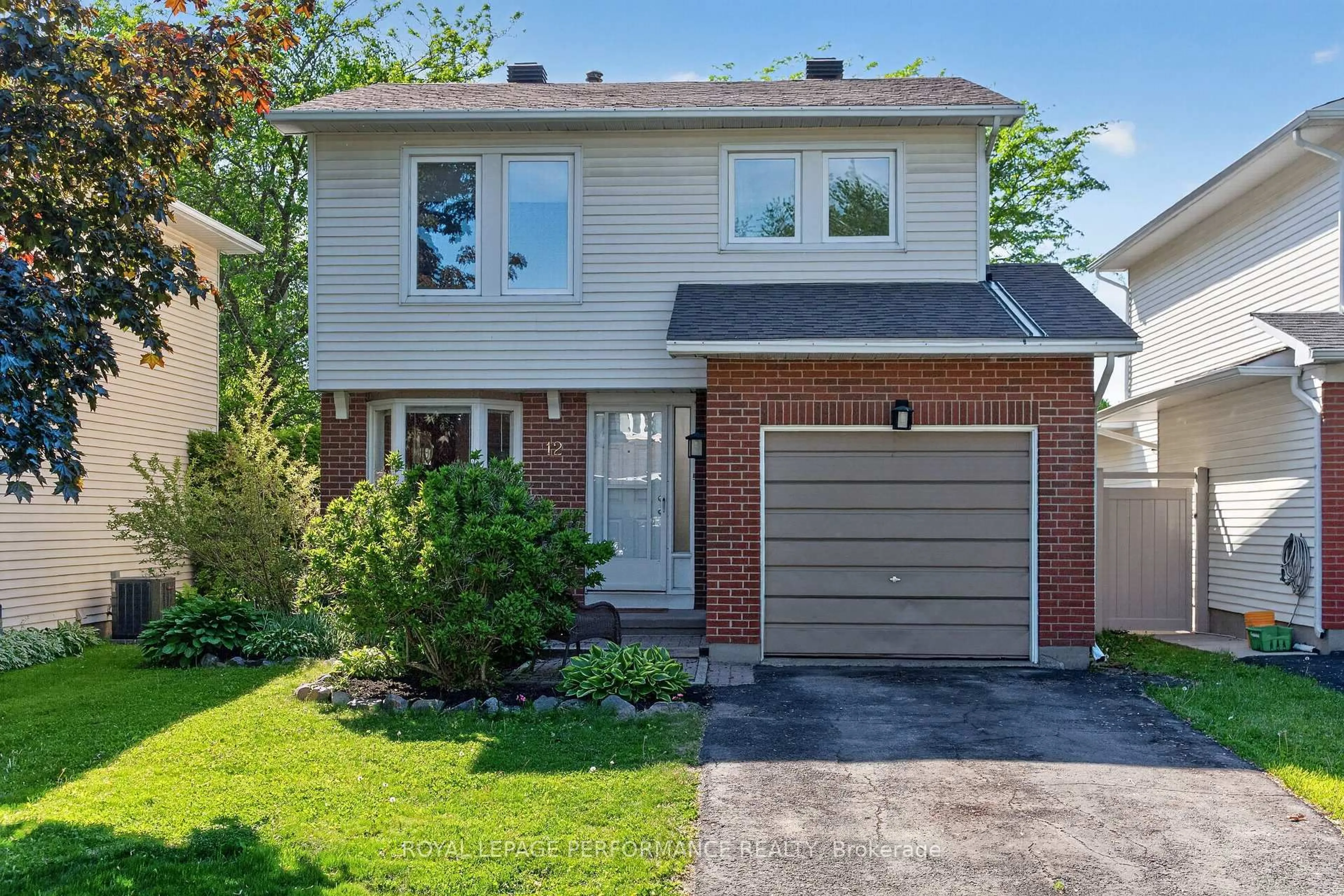 Home with brick exterior material, street for 12 Barra Ave, Ottawa Ontario K2L 2R8