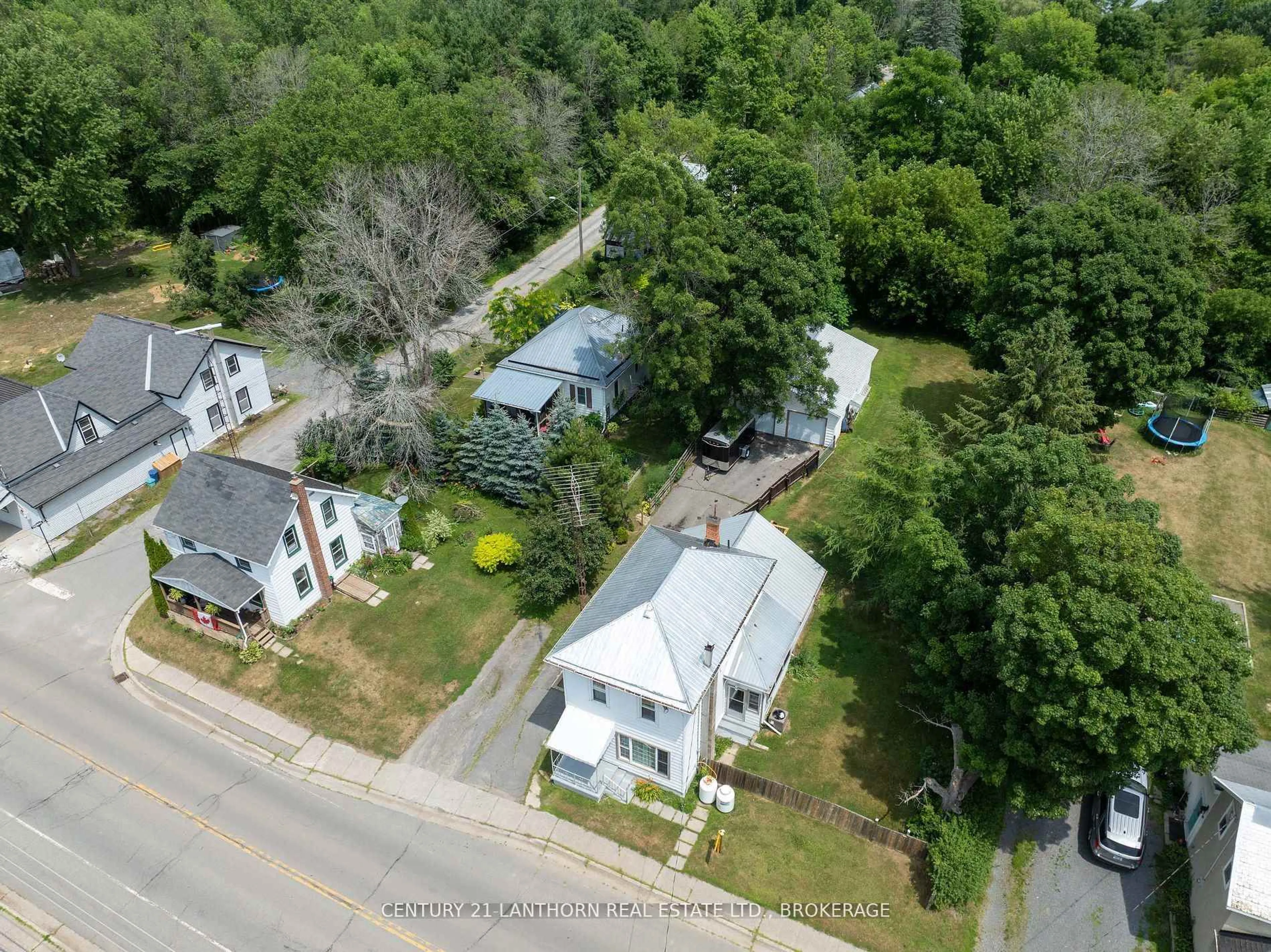 A pic from outside/outdoor area/front of a property/back of a property/a pic from drone, street for 5995 County Road 41, Stone Mills Ontario K0K 2A0