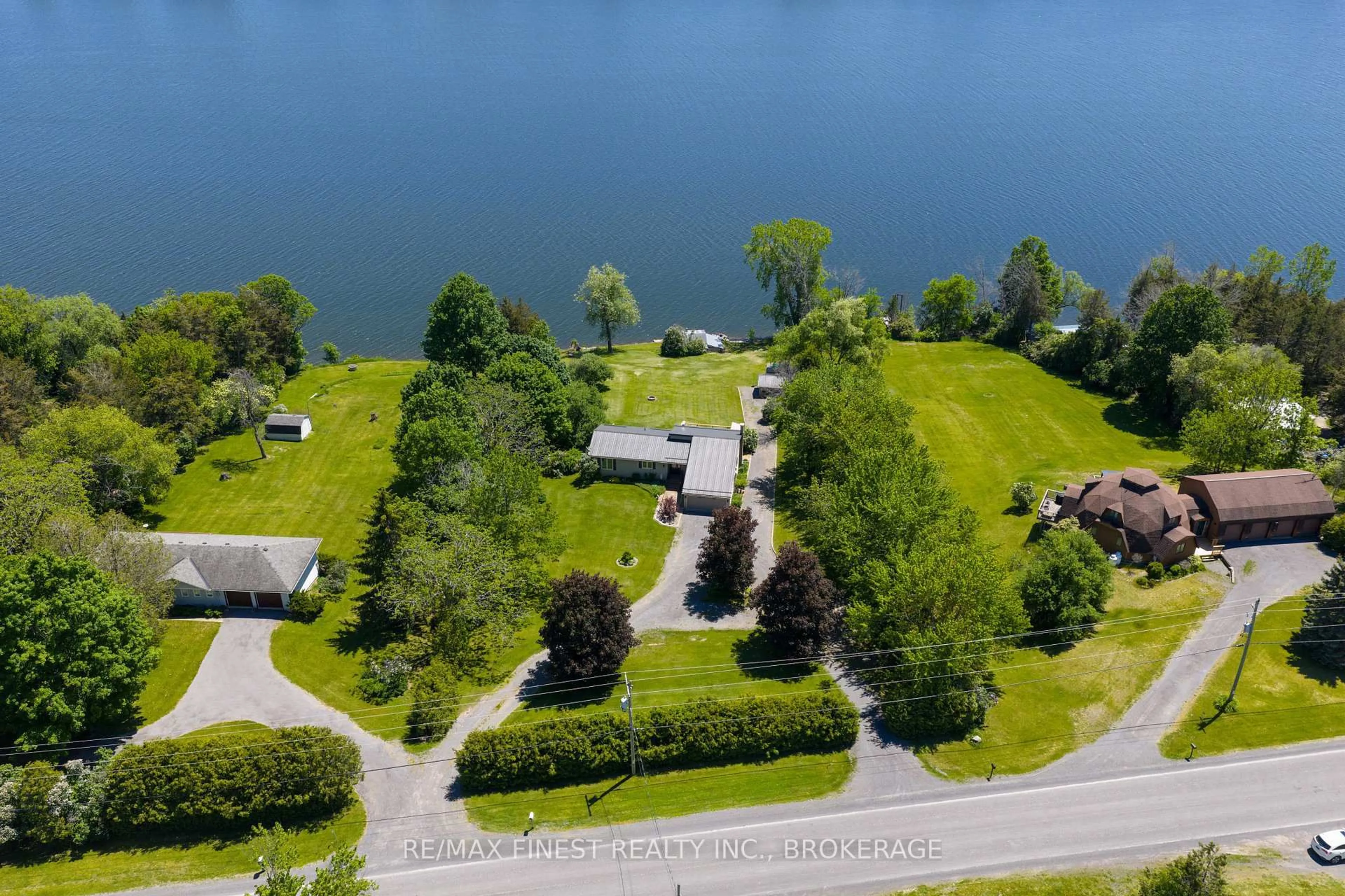 A pic from outside/outdoor area/front of a property/back of a property/a pic from drone, water/lake/river/ocean view for 5103 County Road 9, Napanee Ontario K7R 3K8