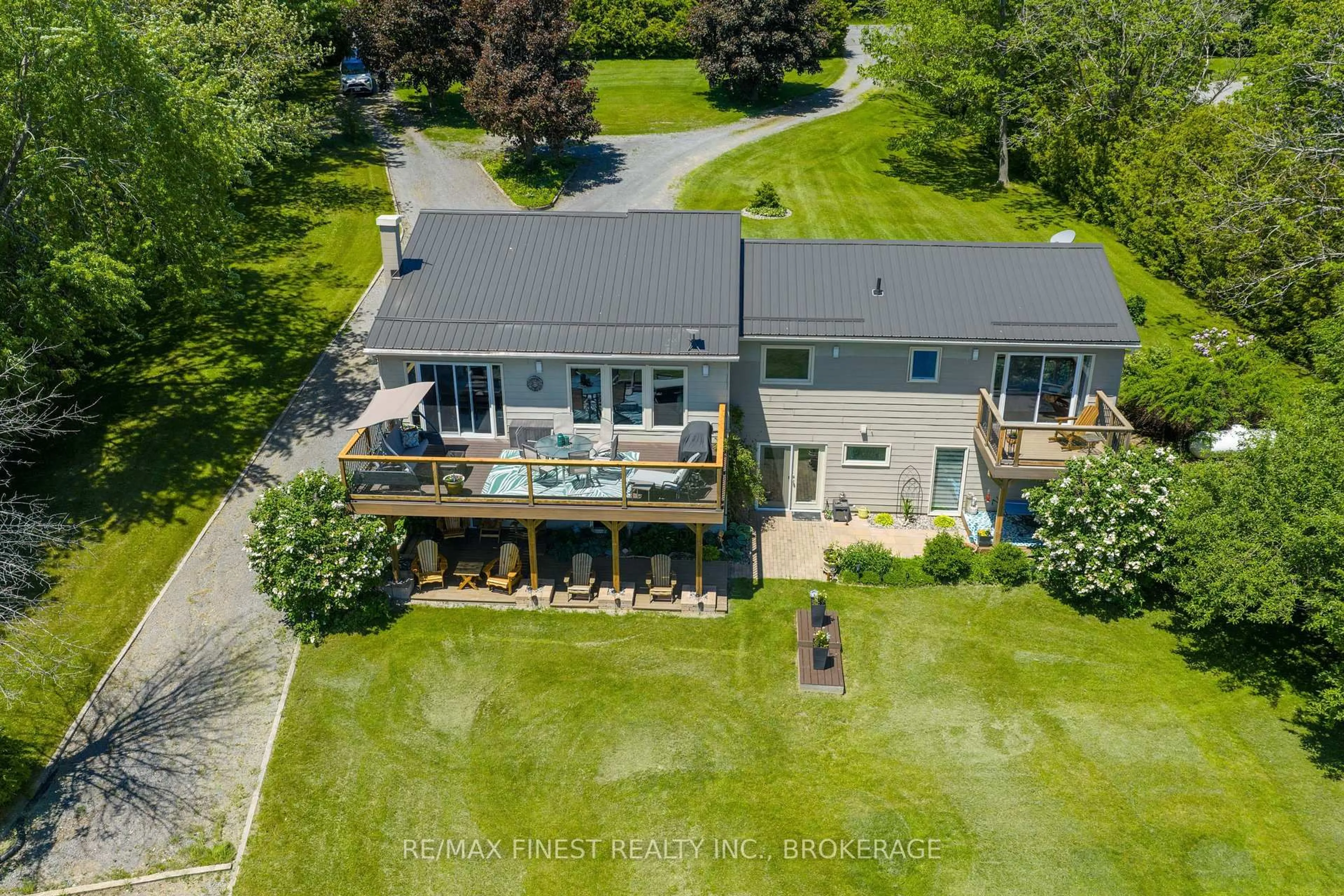 A pic from outside/outdoor area/front of a property/back of a property/a pic from drone, water/lake/river/ocean view for 5103 County Road 9, Napanee Ontario K7R 3K8