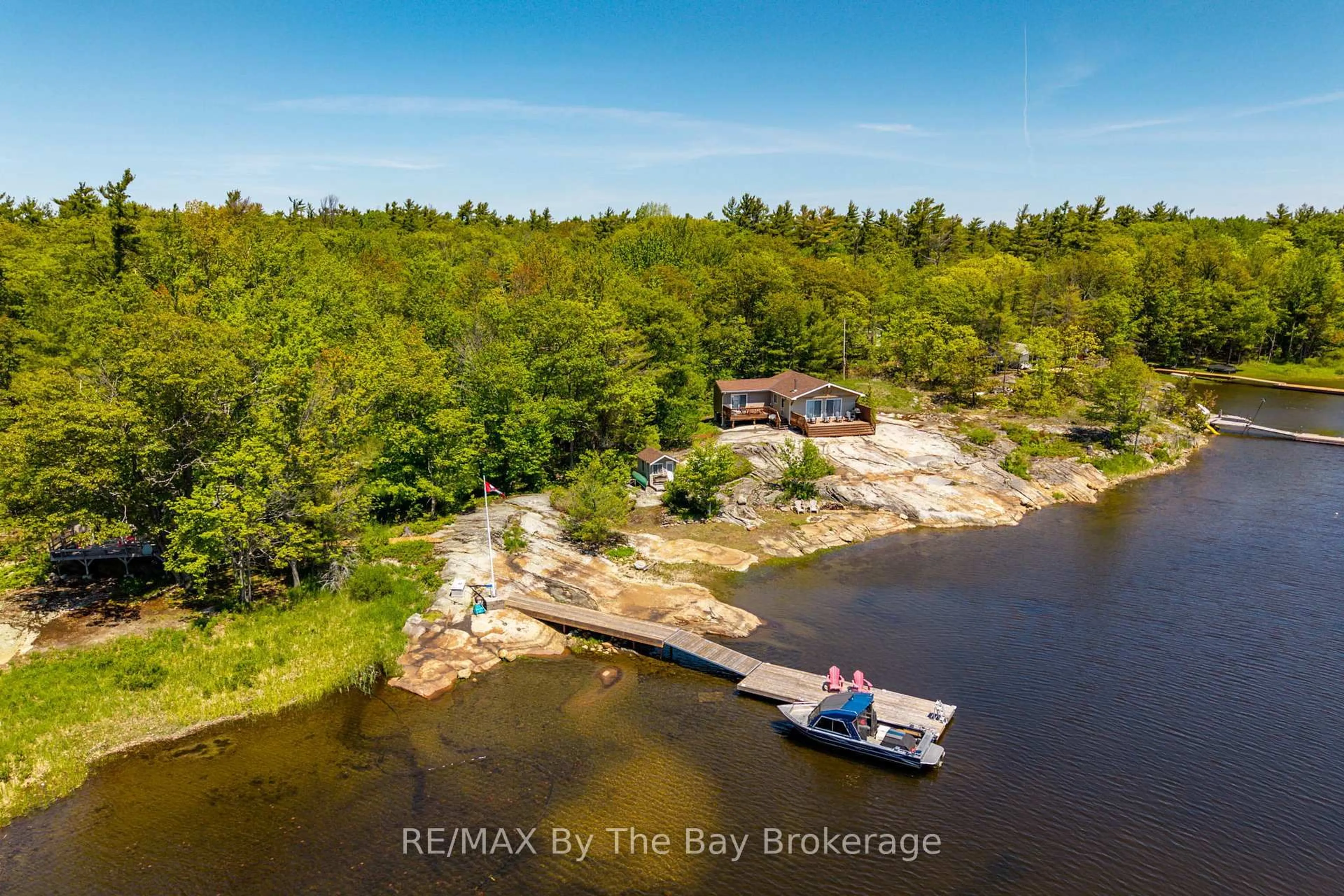 A pic from outside/outdoor area/front of a property/back of a property/a pic from drone, water/lake/river/ocean view for 6980 Island 1810/Bone Island, Georgian Bay Ontario L0K 1E0