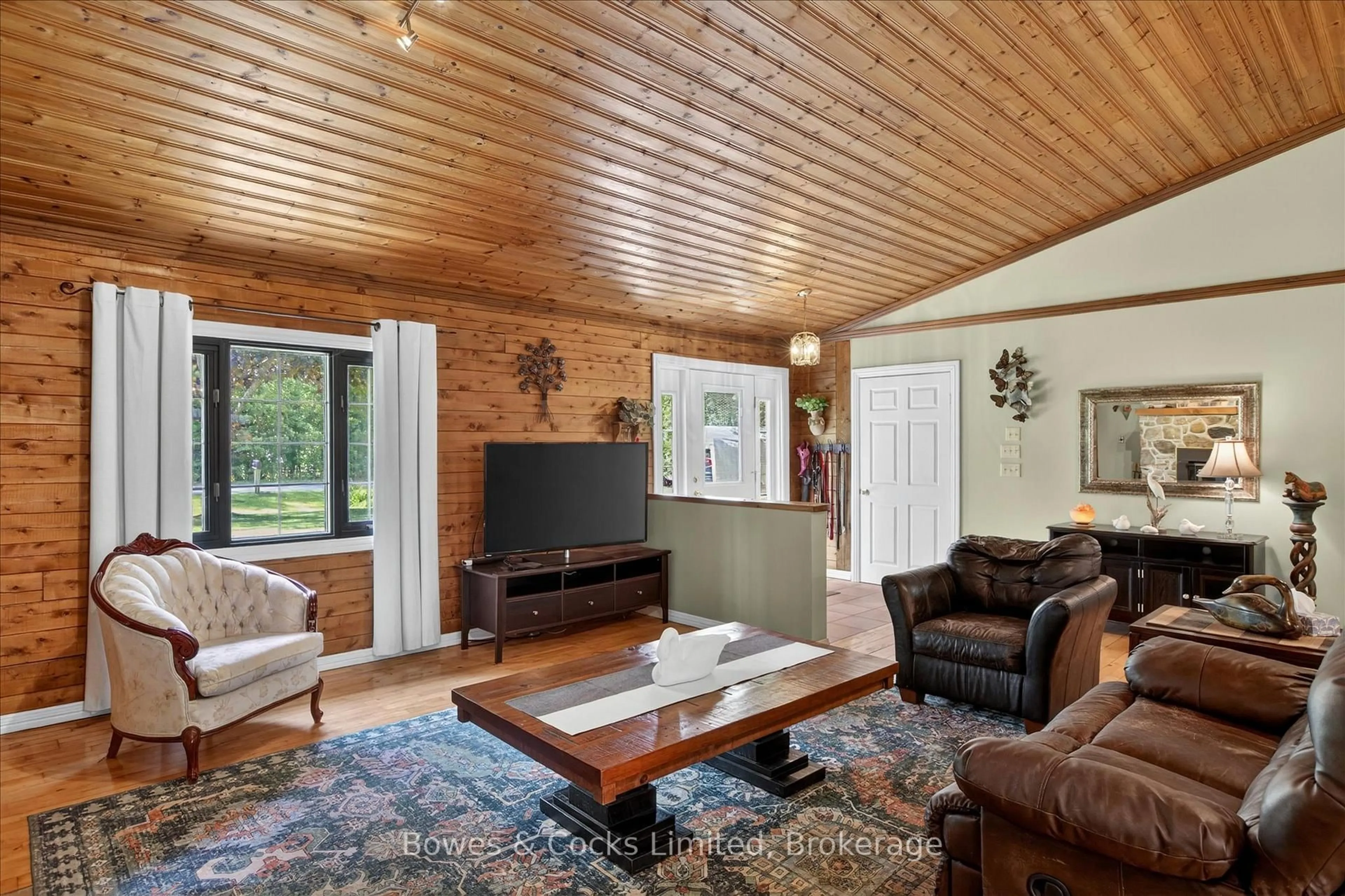 Living room with furniture, wood/laminate floor for 1 Graham Dr, Kawartha Lakes Ontario K0M 1N0
