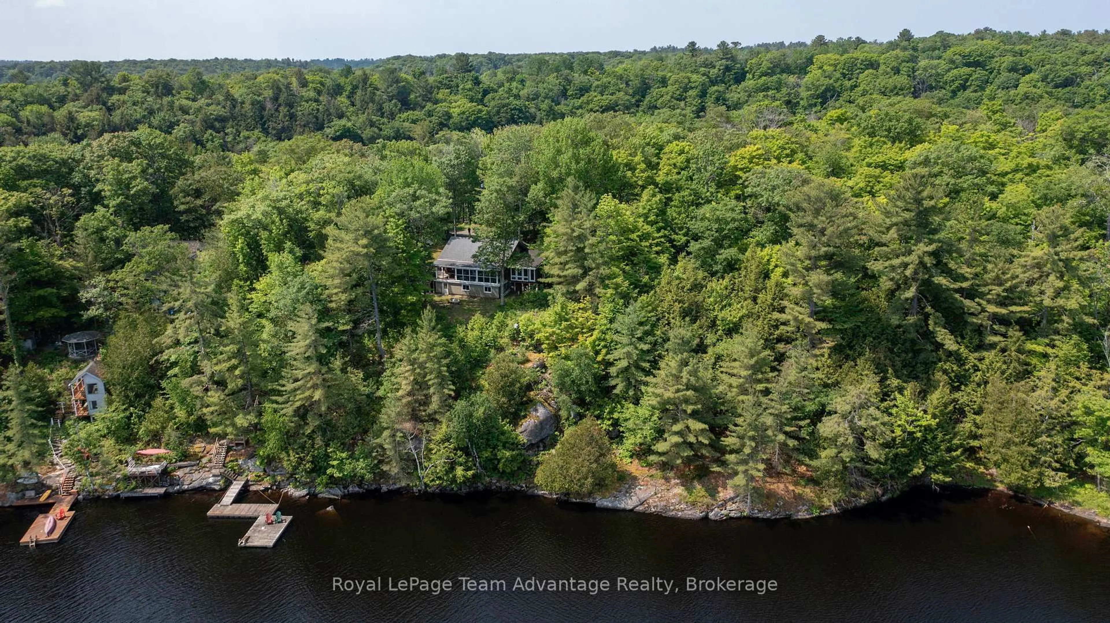 A pic from outside/outdoor area/front of a property/back of a property/a pic from drone, water/lake/river/ocean view for 25 Limbert Lane, McDougall Ontario P2A 2W9