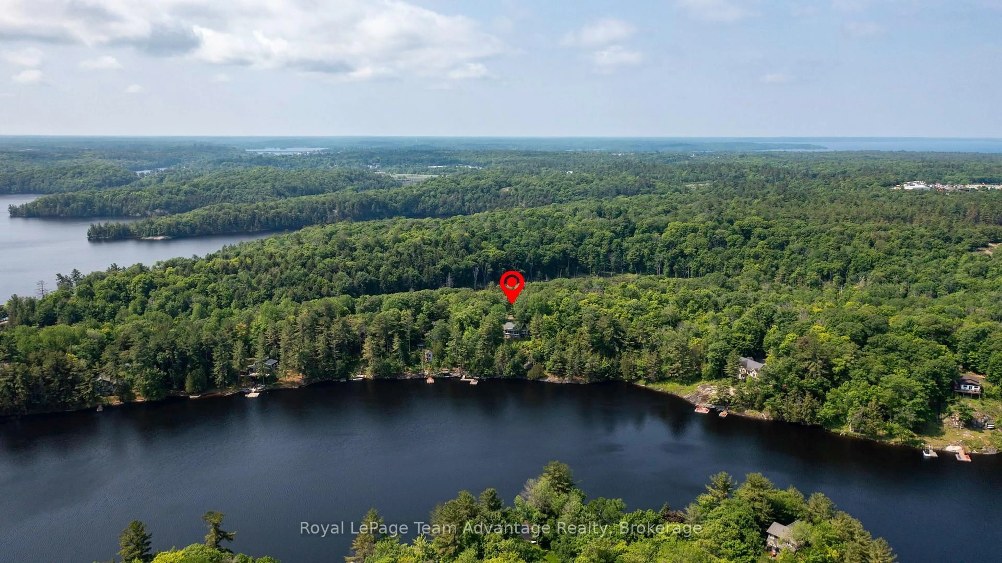 A pic from outside/outdoor area/front of a property/back of a property/a pic from drone, water/lake/river/ocean view for 25 Limbert Lane, McDougall Ontario P2A 2W9
