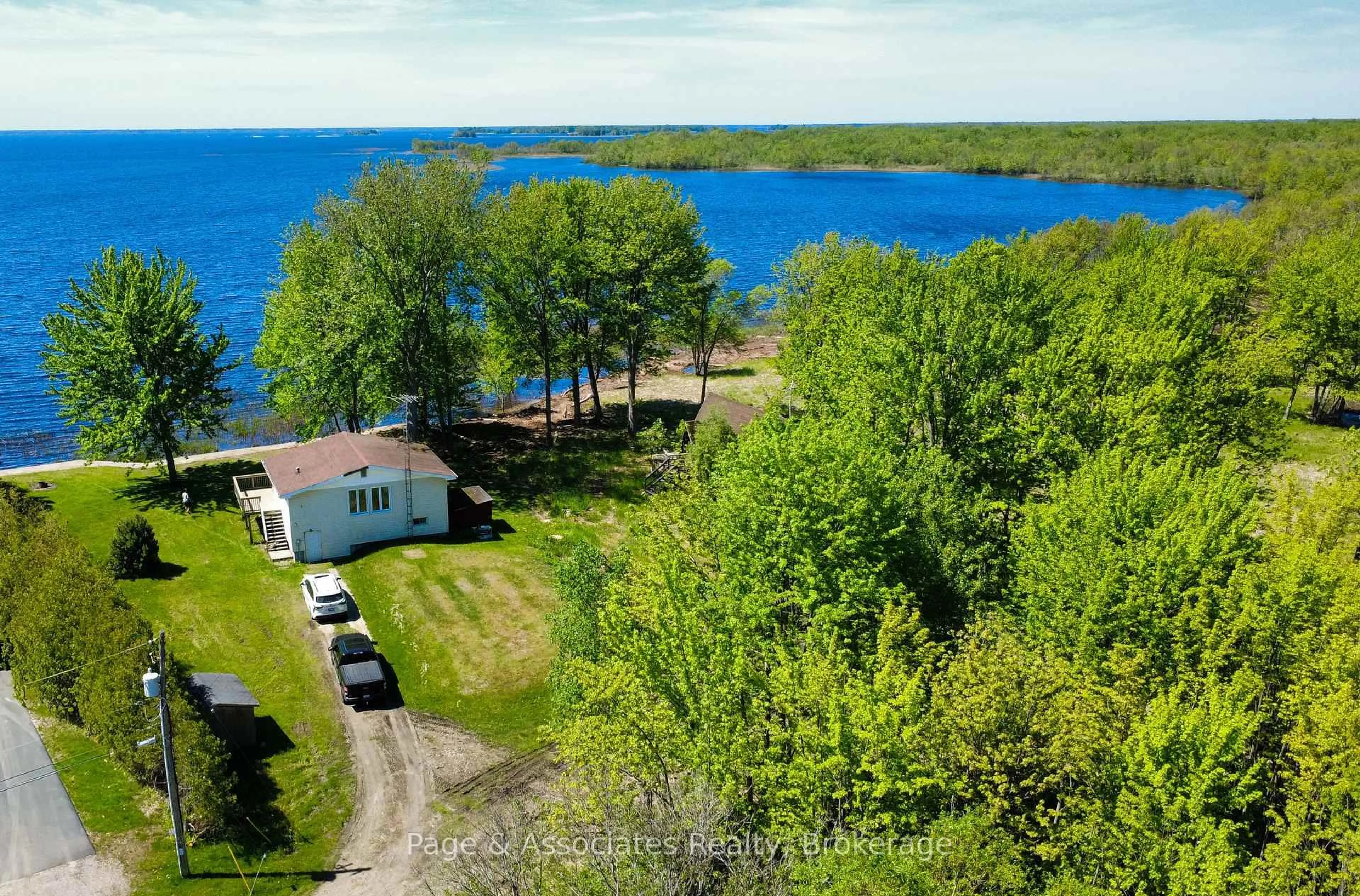 A pic from outside/outdoor area/front of a property/back of a property/a pic from drone, water/lake/river/ocean view for 700 Lac Deux Milles Rd, West Nipissing Ontario P2B 2X4