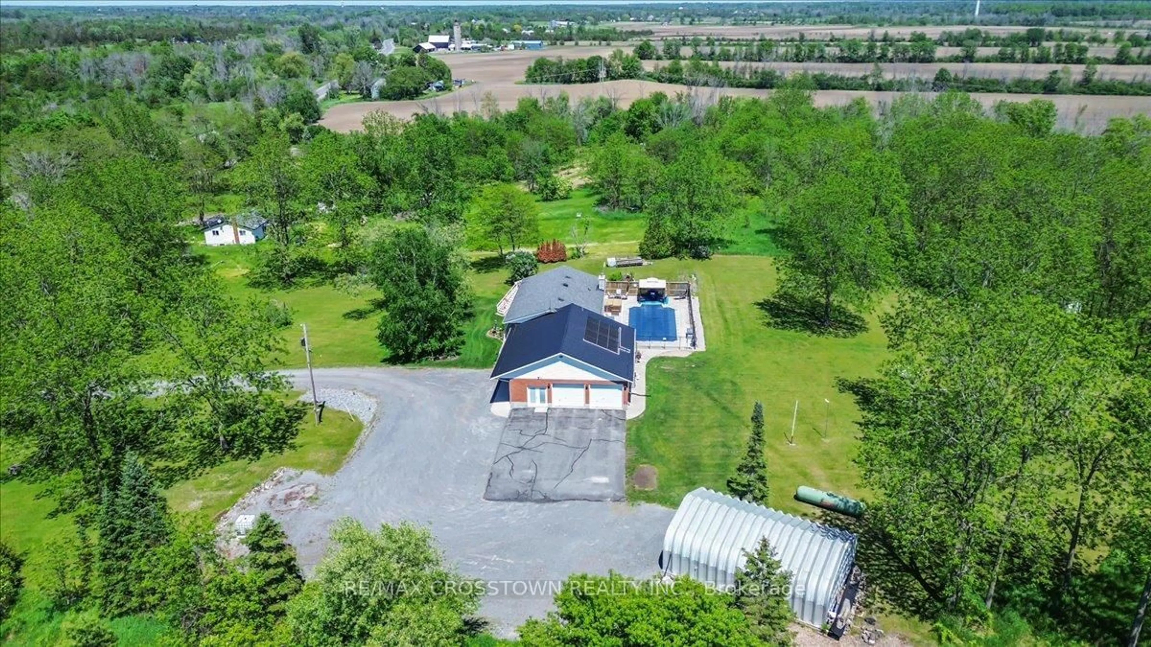 A pic from outside/outdoor area/front of a property/back of a property/a pic from drone, unknown for 1074 Millhaven Rd, Bissett Creek Ontario K0H 2H0