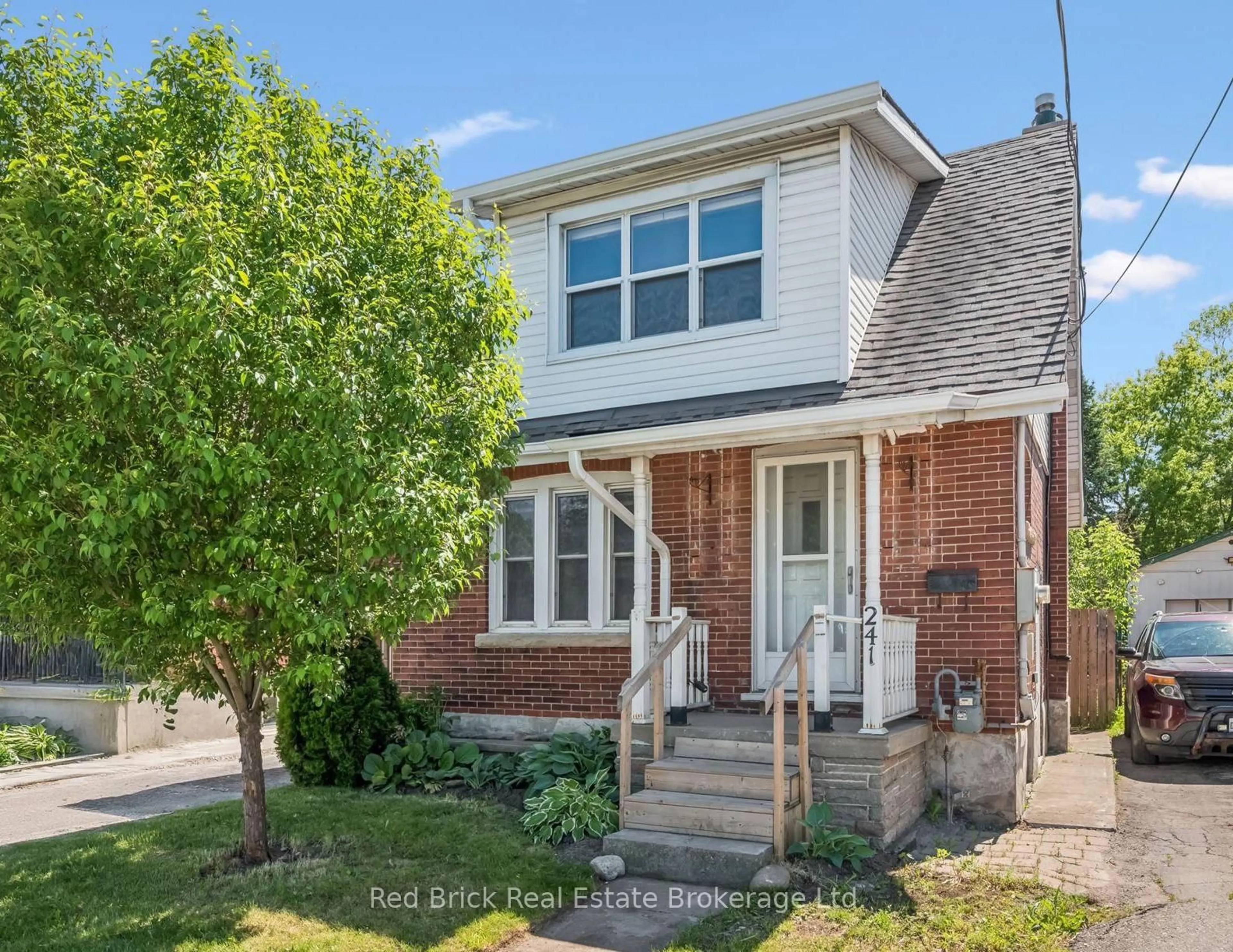 Home with brick exterior material, street for 241 Victoria Rd, Guelph Ontario N1E 5P9