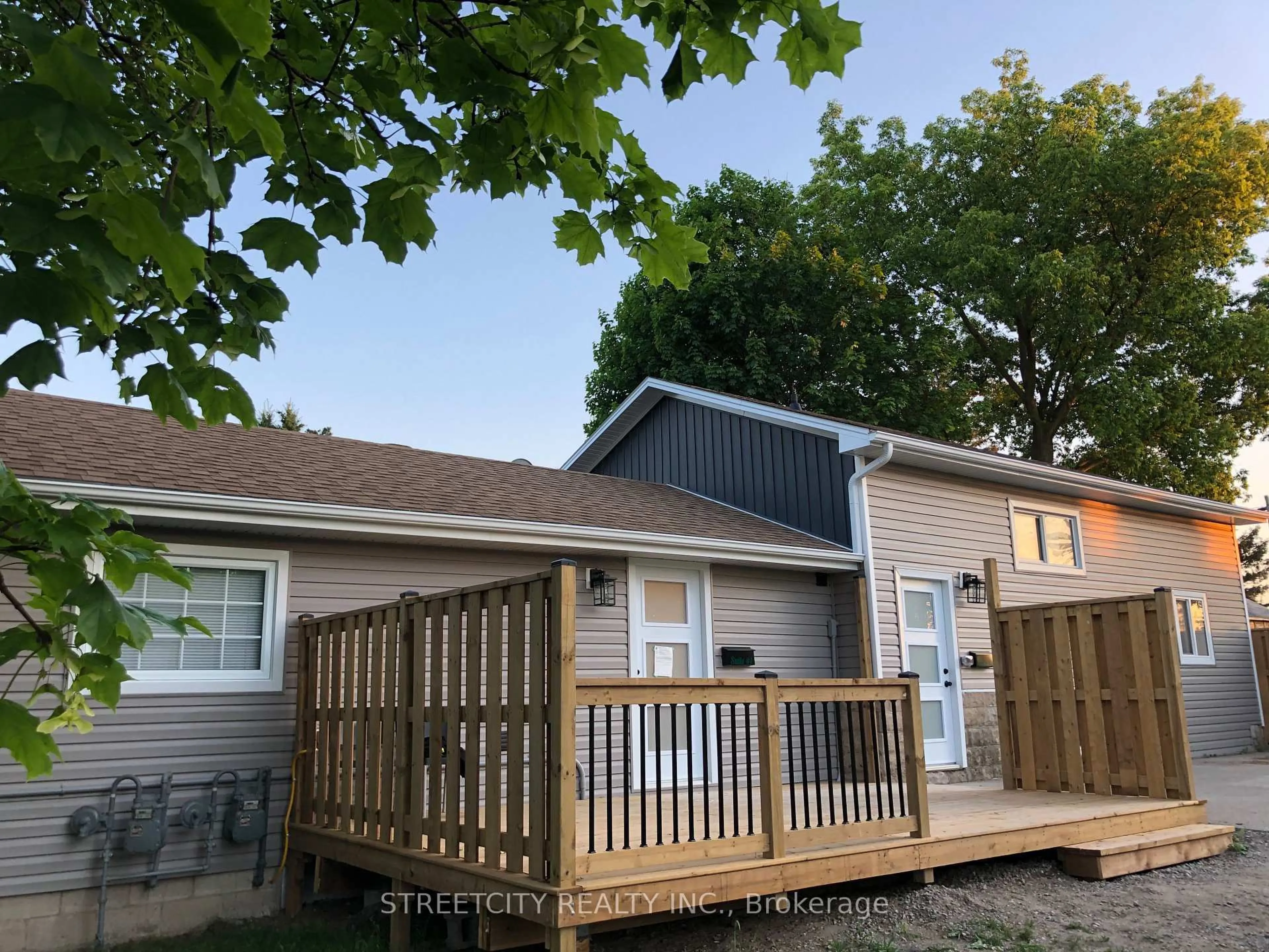 Home with vinyl exterior material, street for 163 Emerson St, London South Ontario N5Z 3L5