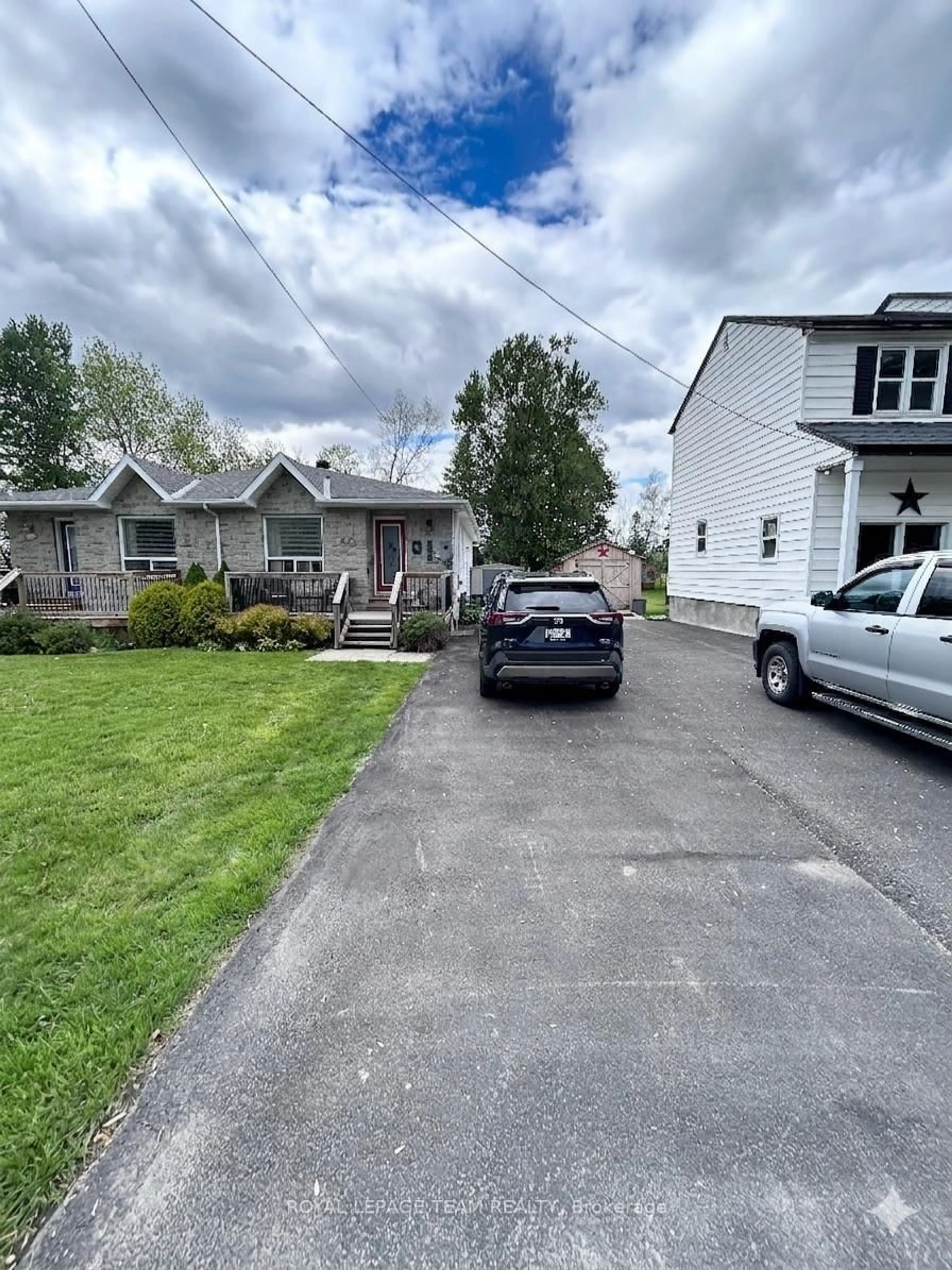 A pic from outside/outdoor area/front of a property/back of a property/a pic from drone, street for 50D Fifth St, South Dundas Ontario K0C 1X0