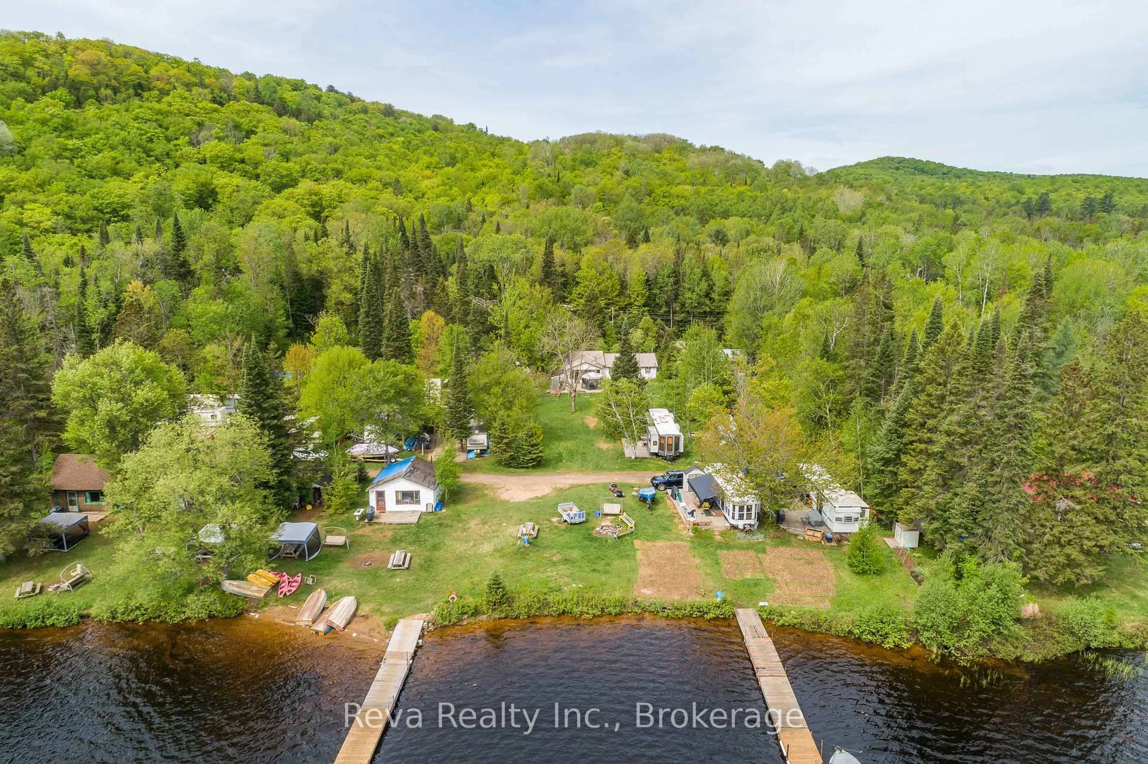 A pic from outside/outdoor area/front of a property/back of a property/a pic from drone, water/lake/river/ocean view for 1535 North Baptiste Lake Rd, Bancroft Ontario K0L 1C0