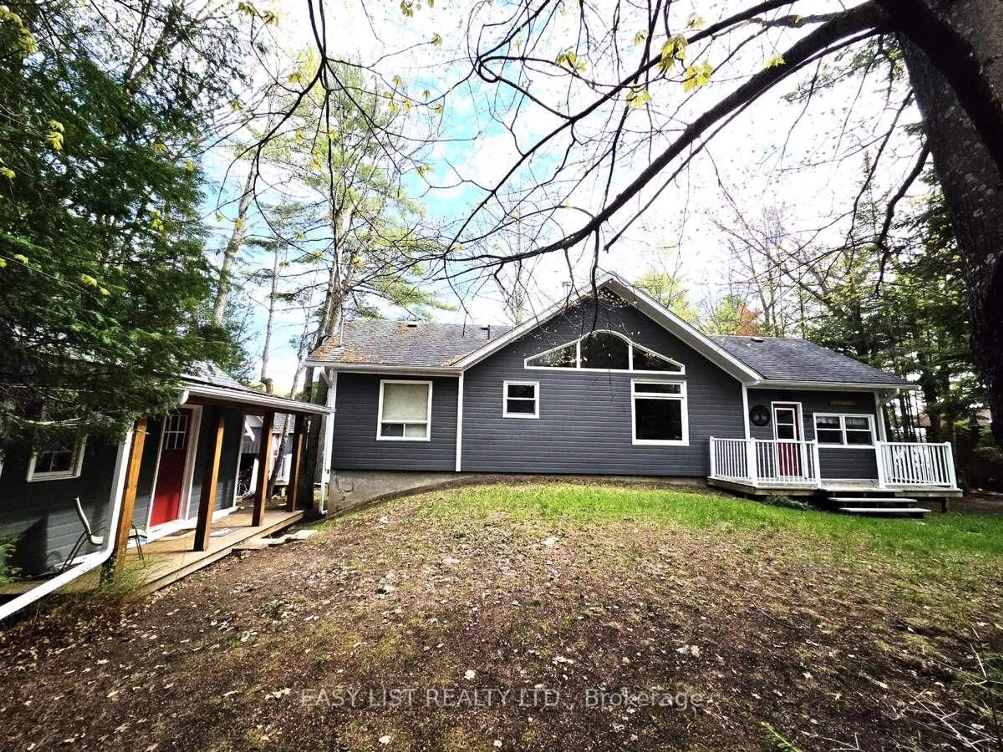 A pic from outside/outdoor area/front of a property/back of a property/a pic from drone, forest/trees view for 1093 Wilderness Tr, Highlands East Ontario K6H 5R7