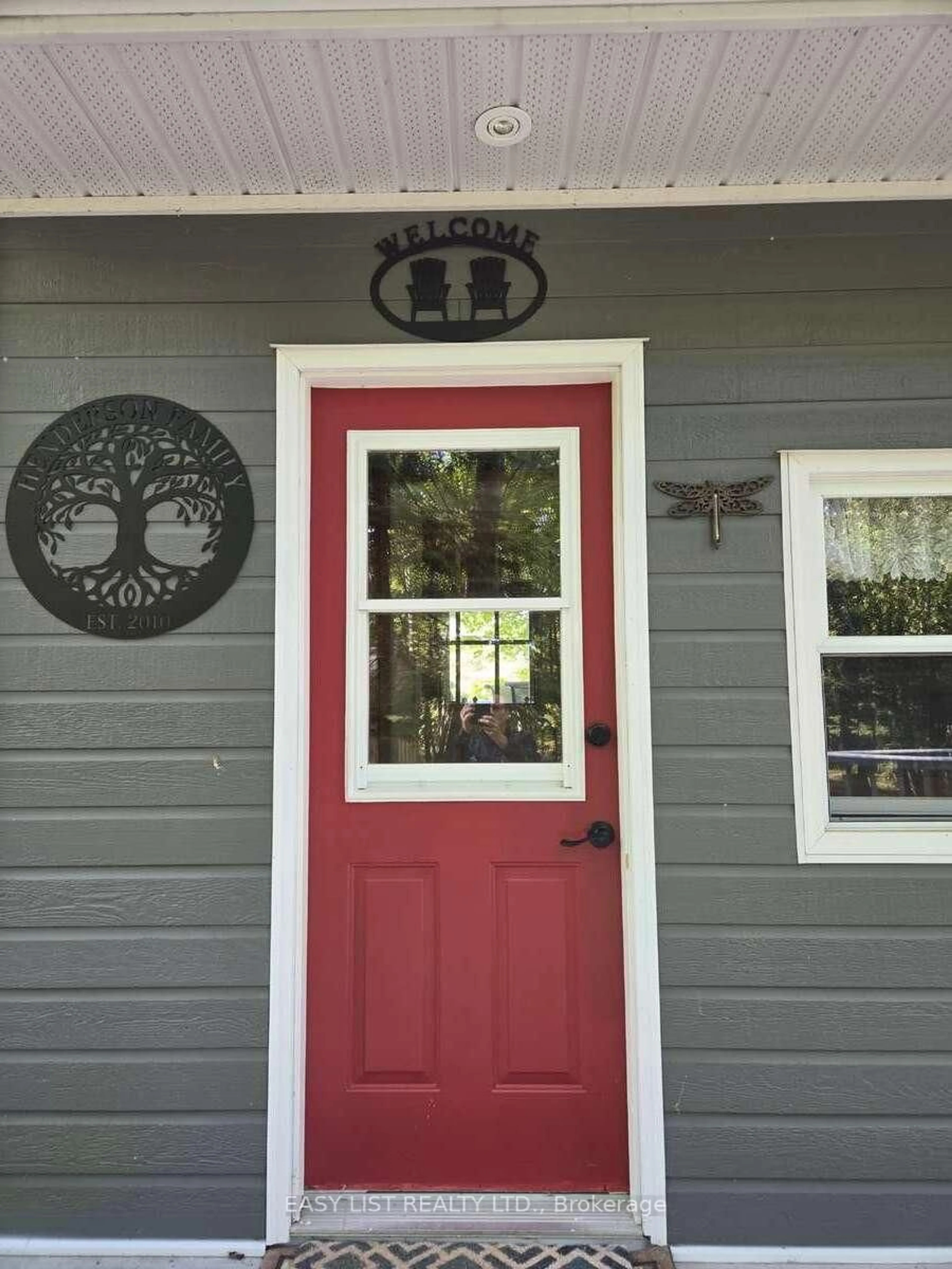 Home with vinyl exterior material, street for 1093 Wilderness Tr, Highlands East Ontario K6H 5R7